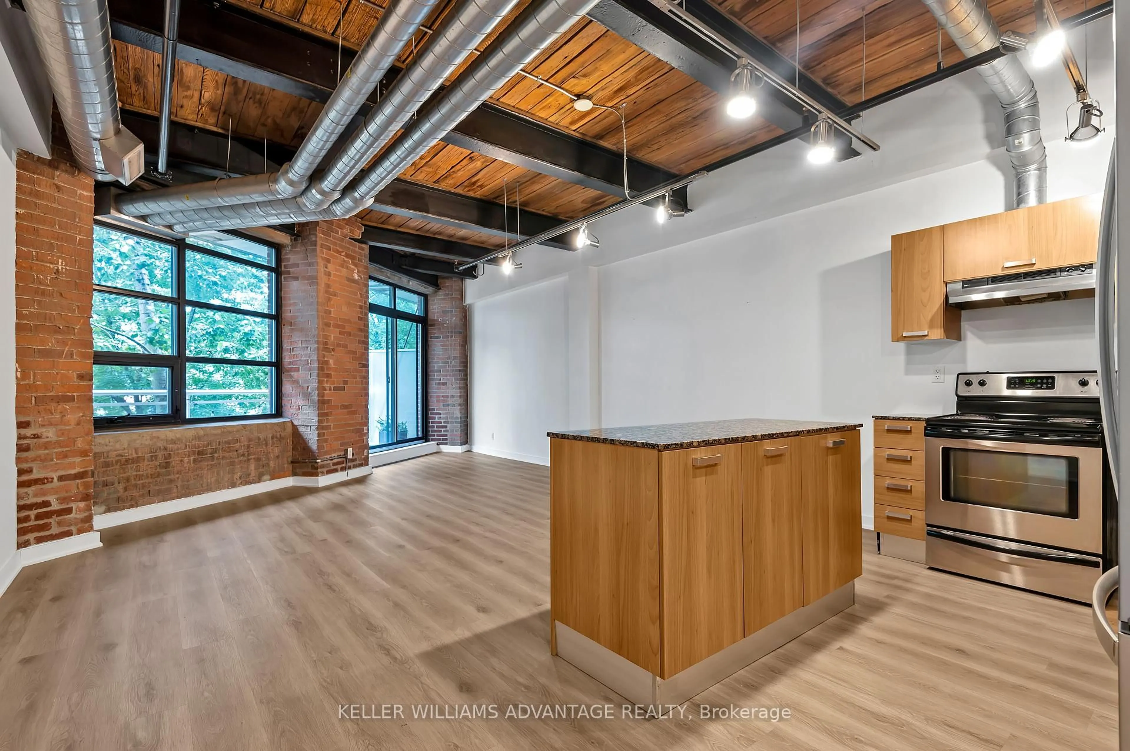 Open concept kitchen, unknown for 43 Hanna Ave #207, Toronto Ontario M6K 1X6