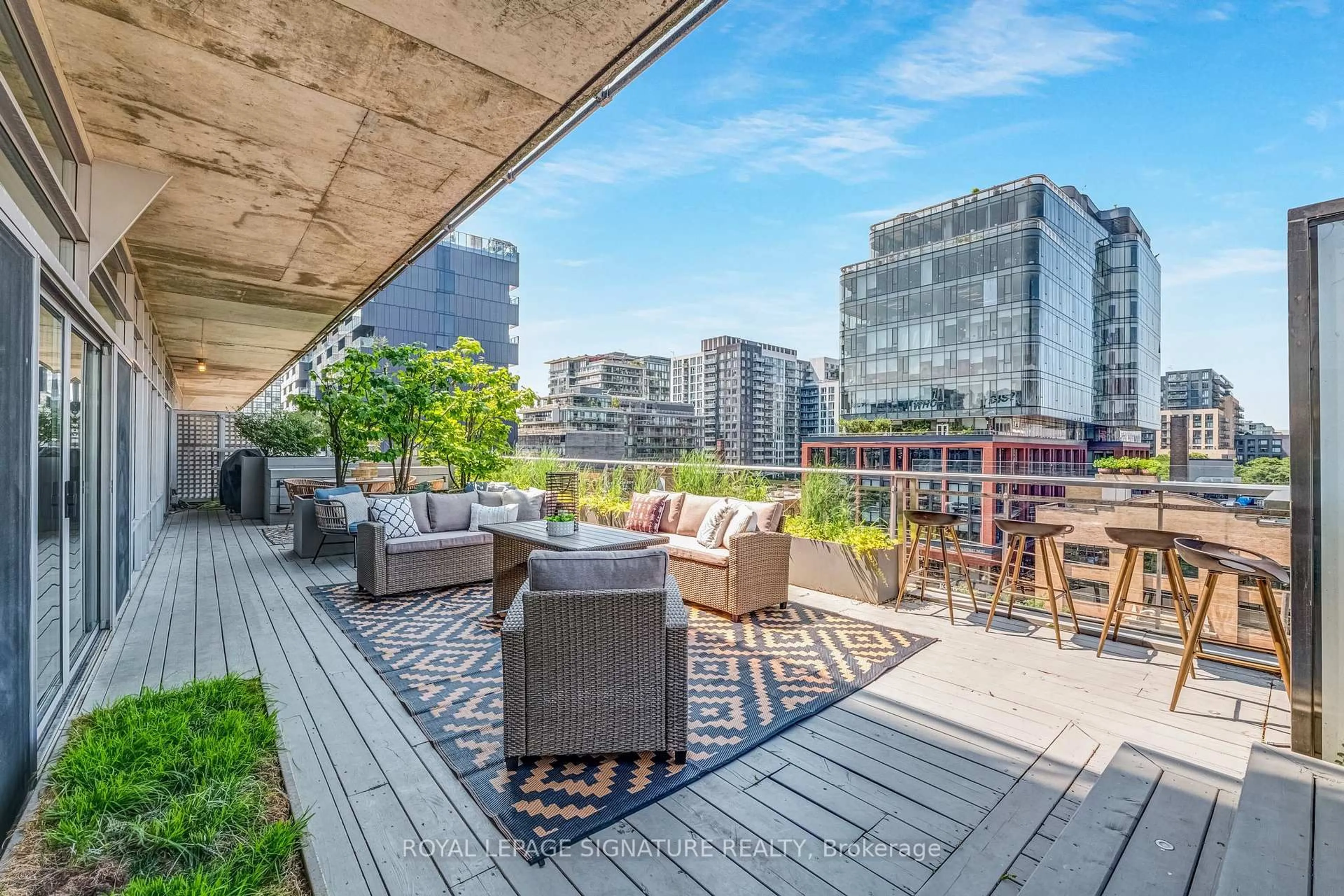 Patio, city buildings view from balcony for 66 Portland St #708, Toronto Ontario M5V 2M6
