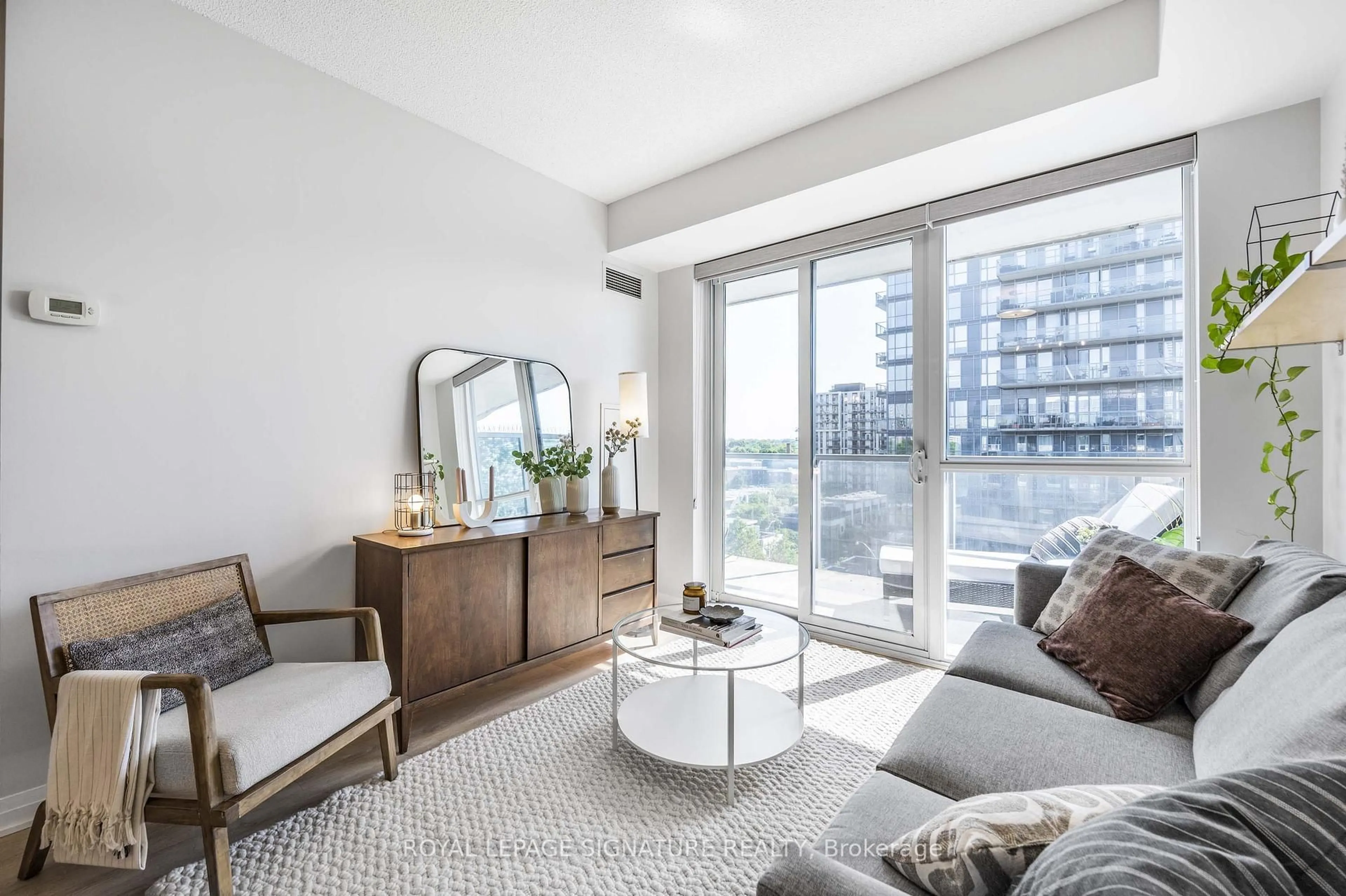 Living room with furniture, unknown for 1 Cole St #804, Toronto Ontario M5A 4M2