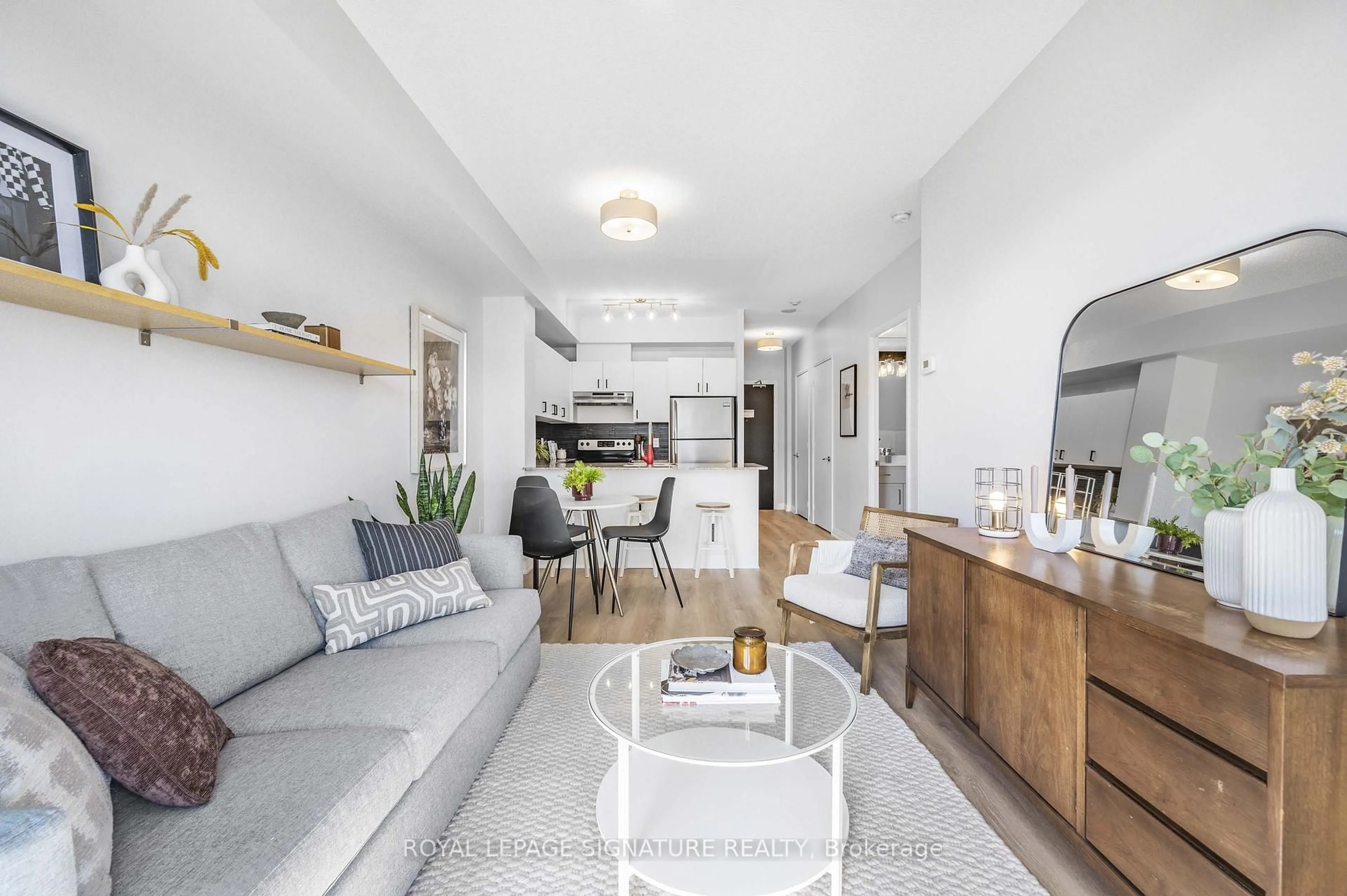 Living room with furniture, unknown for 1 Cole St #804, Toronto Ontario M5A 4M2