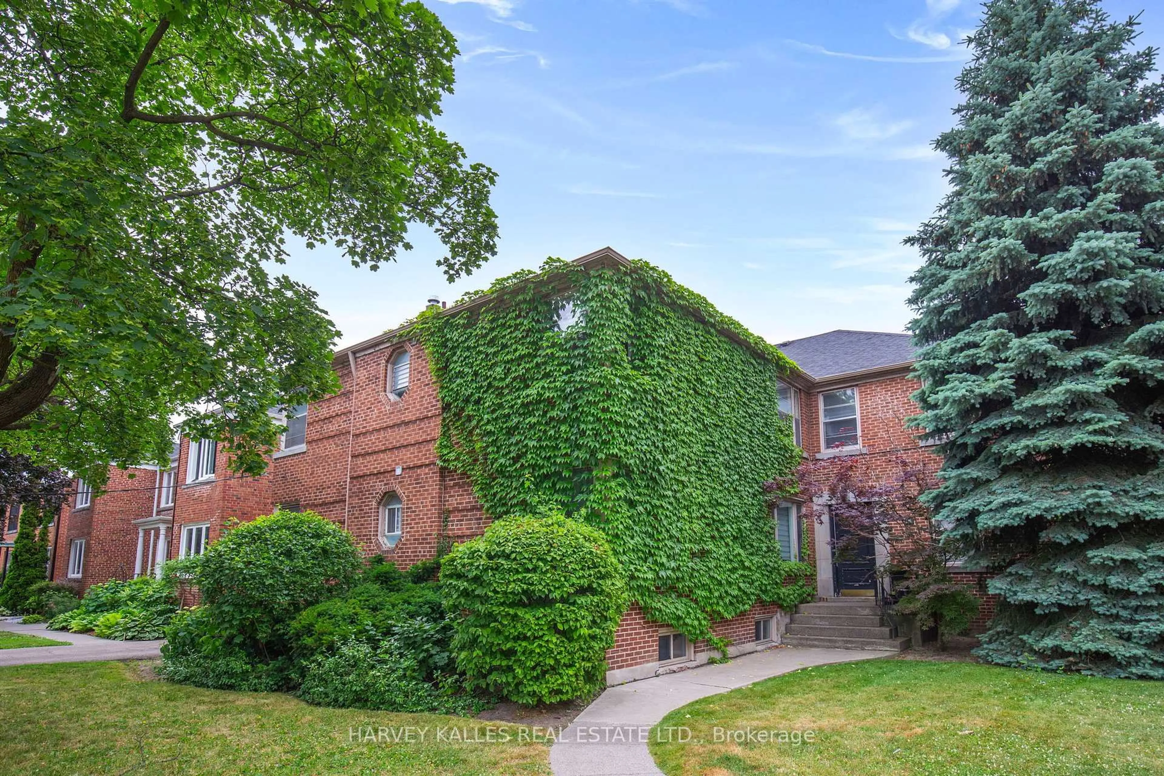 Home with brick exterior material, street for 15 Warwick Ave #3, Toronto Ontario M6C 1T5