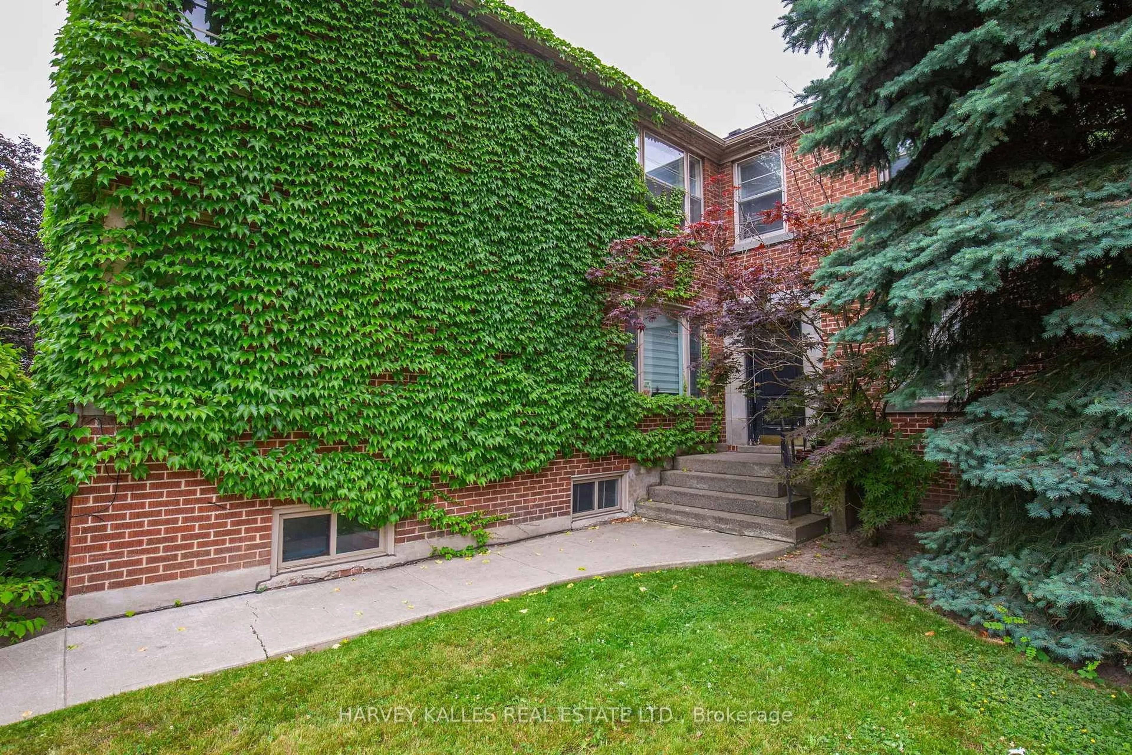 Home with brick exterior material, street for 15 Warwick Ave #3, Toronto Ontario M6C 1T5