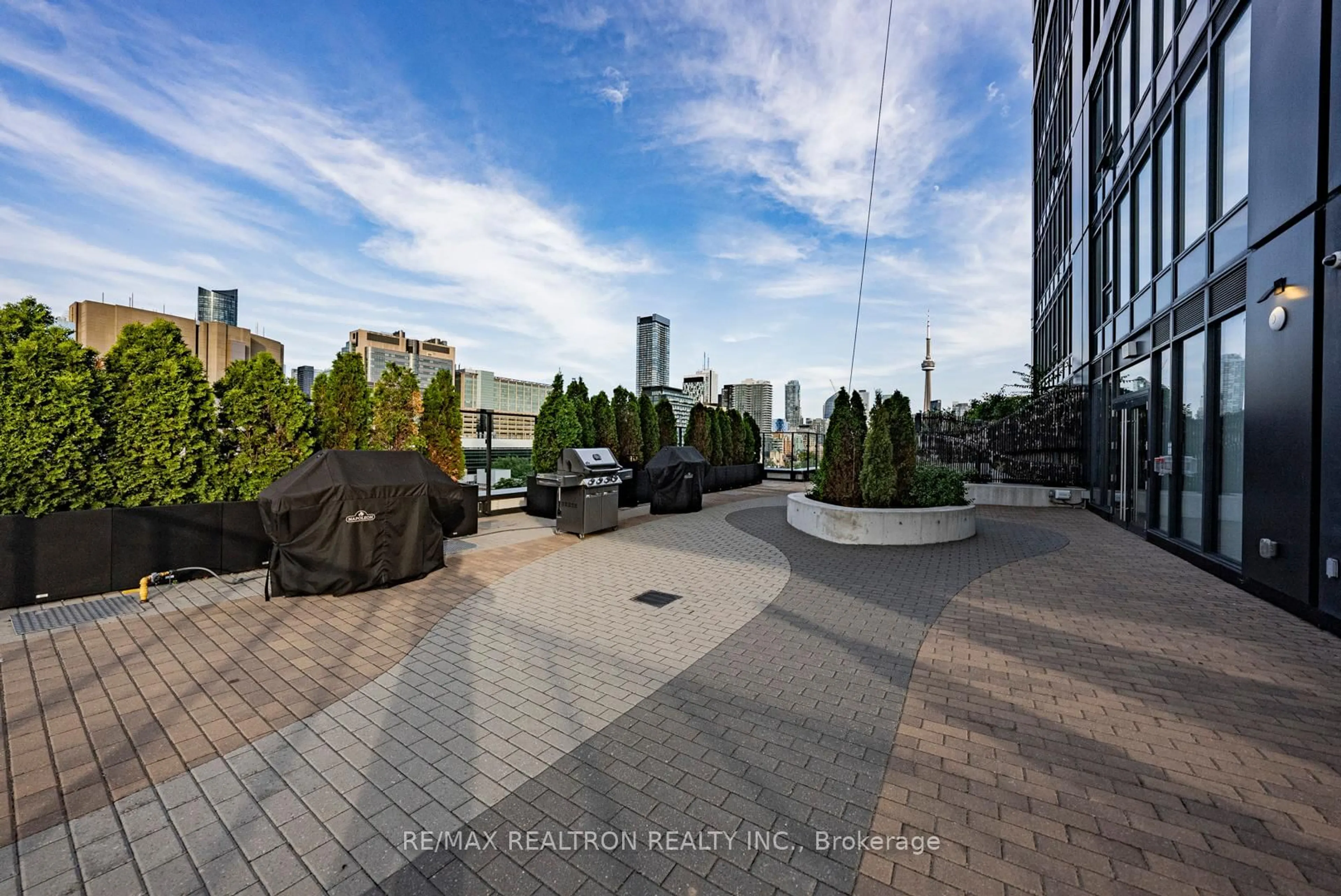 Patio, city buildings view from balcony for 203 College St #2105, Toronto Ontario M5T 0C8