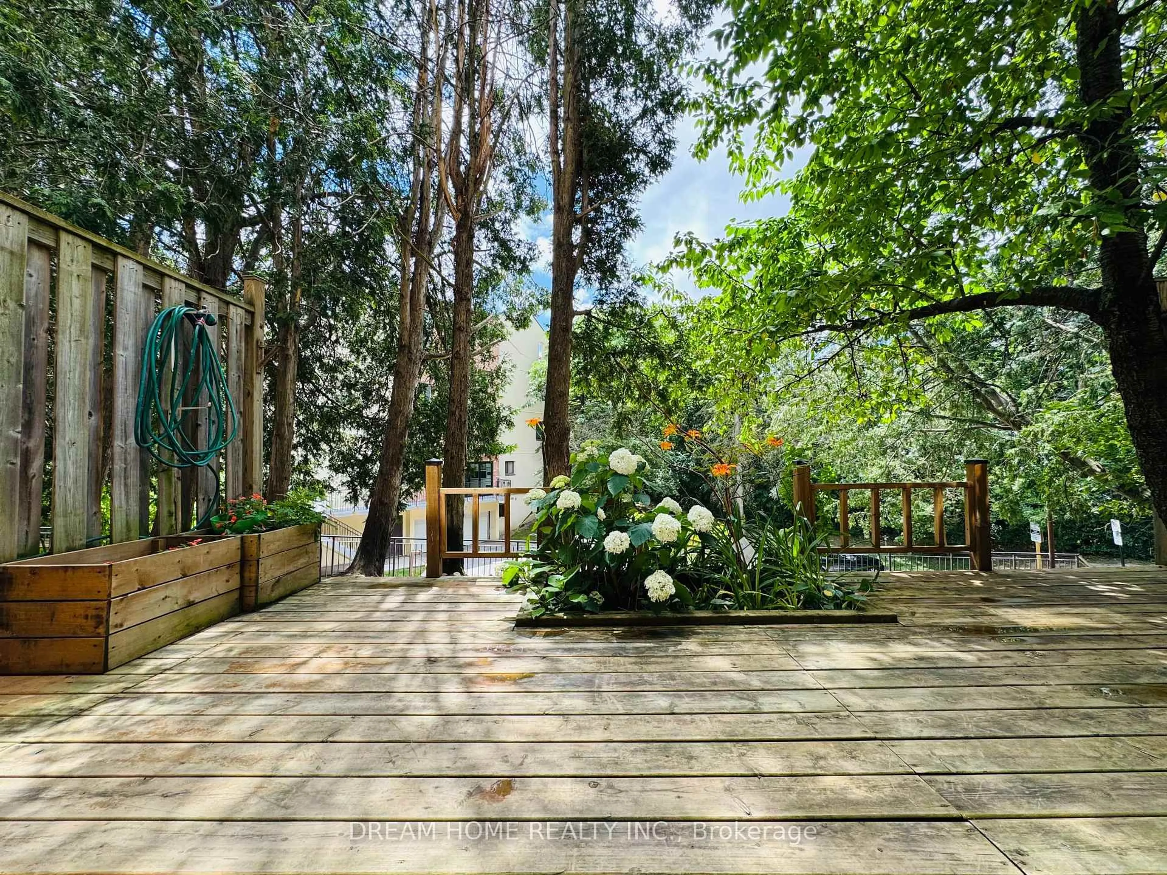 A pic from outside/outdoor area/front of a property/back of a property/a pic from drone, forest/trees view for 25 Pebble Bywy #11, Toronto Ontario M2H 3J6