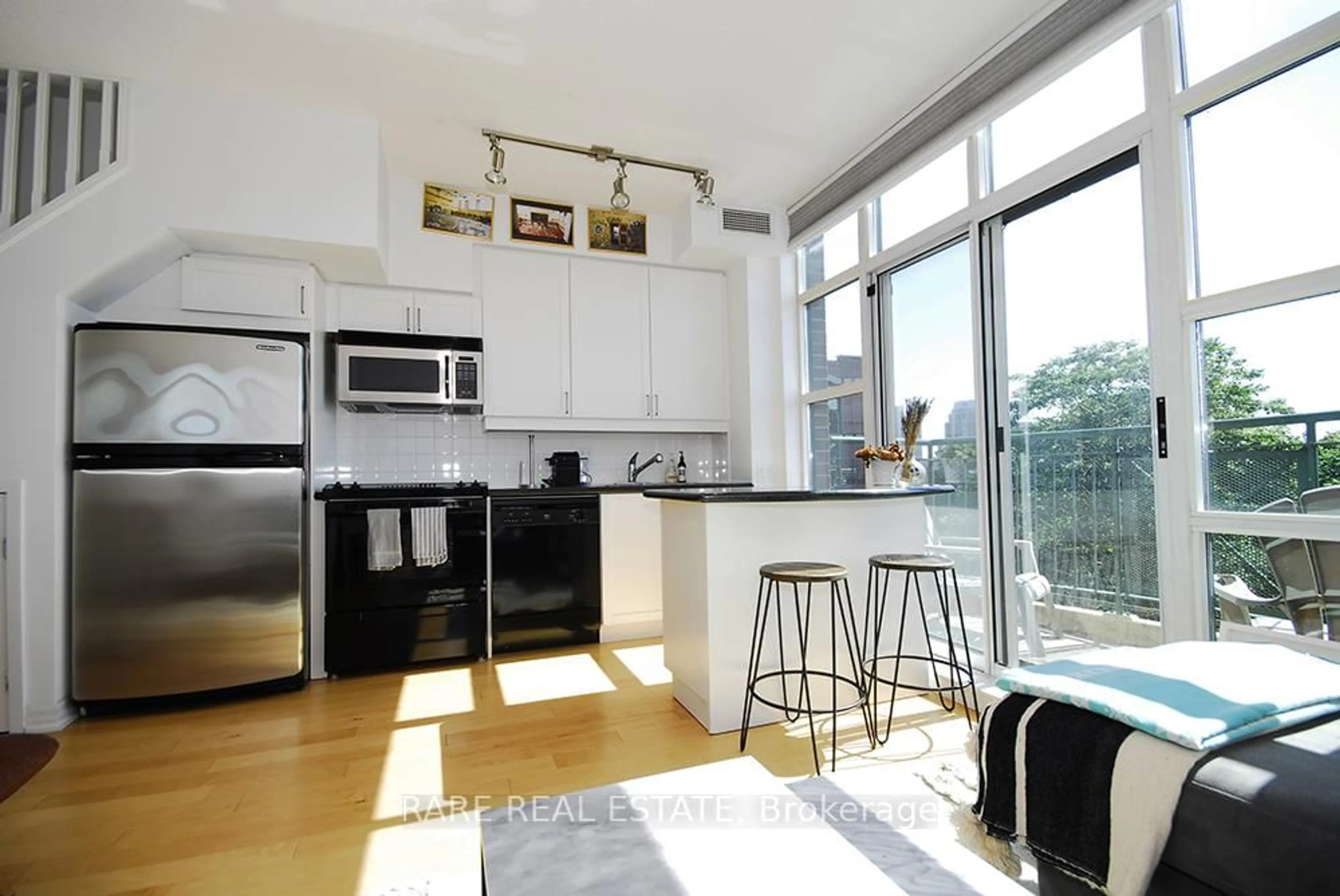 Open concept kitchen, unknown for 901 Queen St #623, Toronto Ontario M6J 3X4