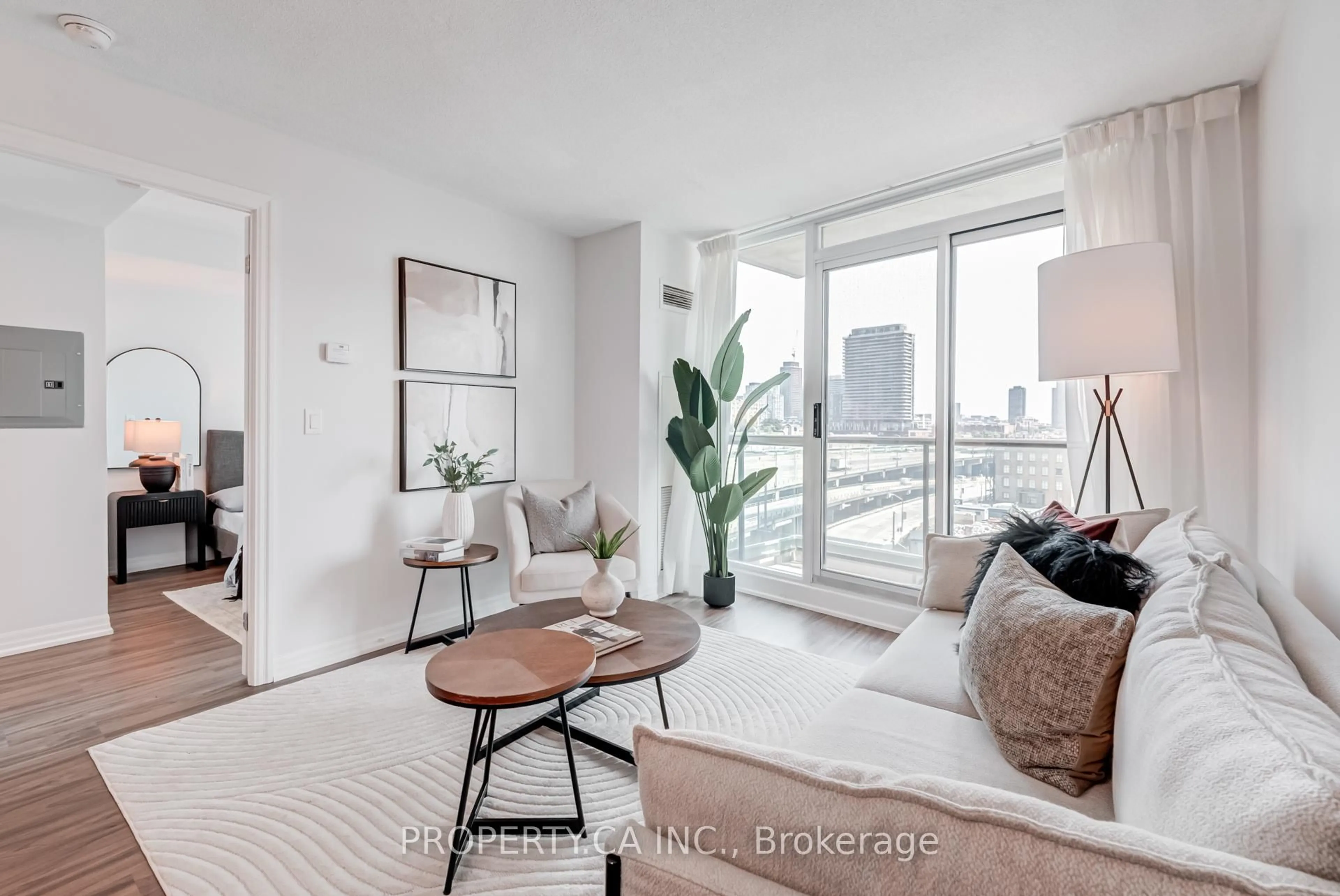 Living room with furniture, unknown for 16 Yonge St #907, Toronto Ontario M5E 2A1