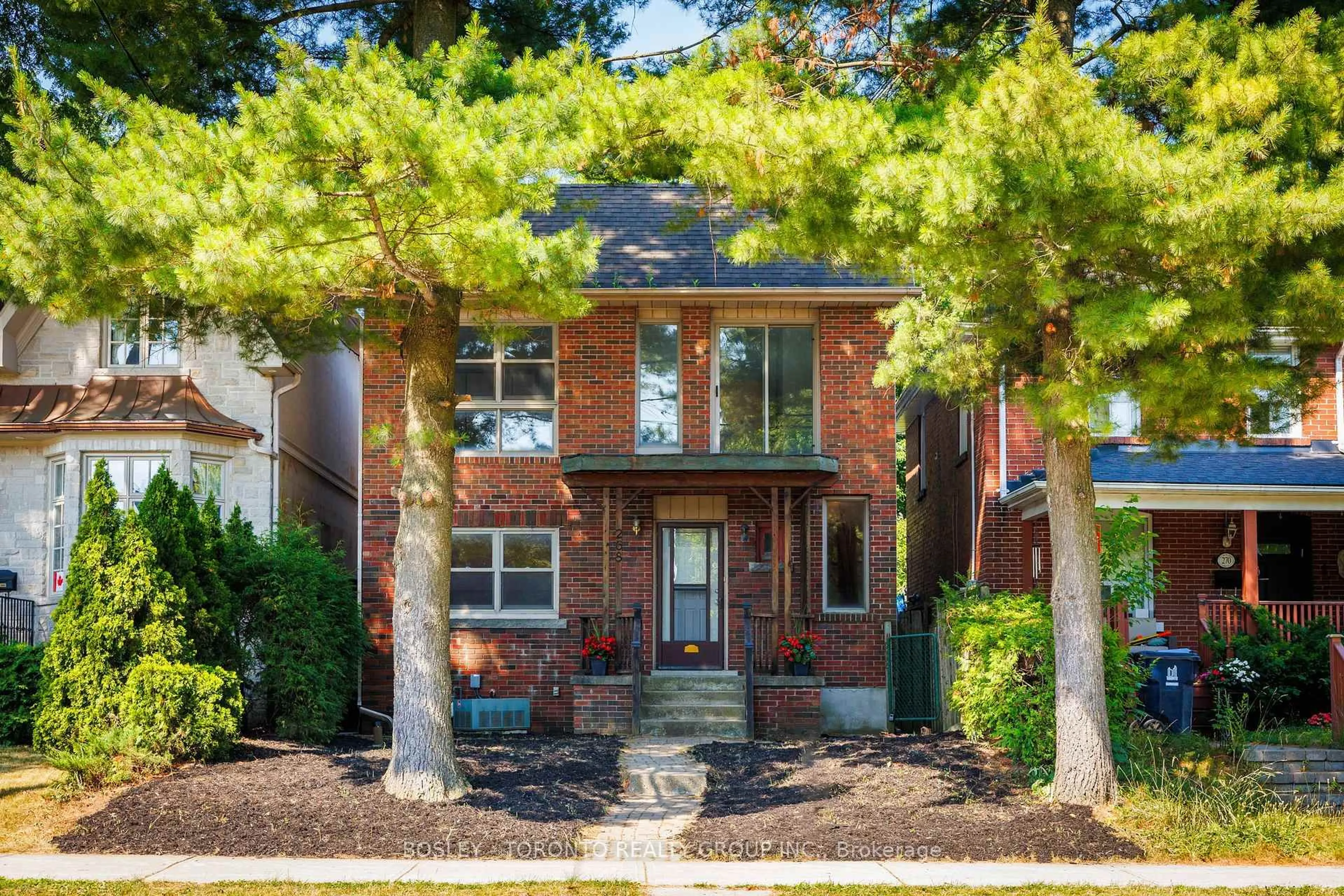 Home with brick exterior material, street for 268 Sutherland Dr, Toronto Ontario M4G 1J3
