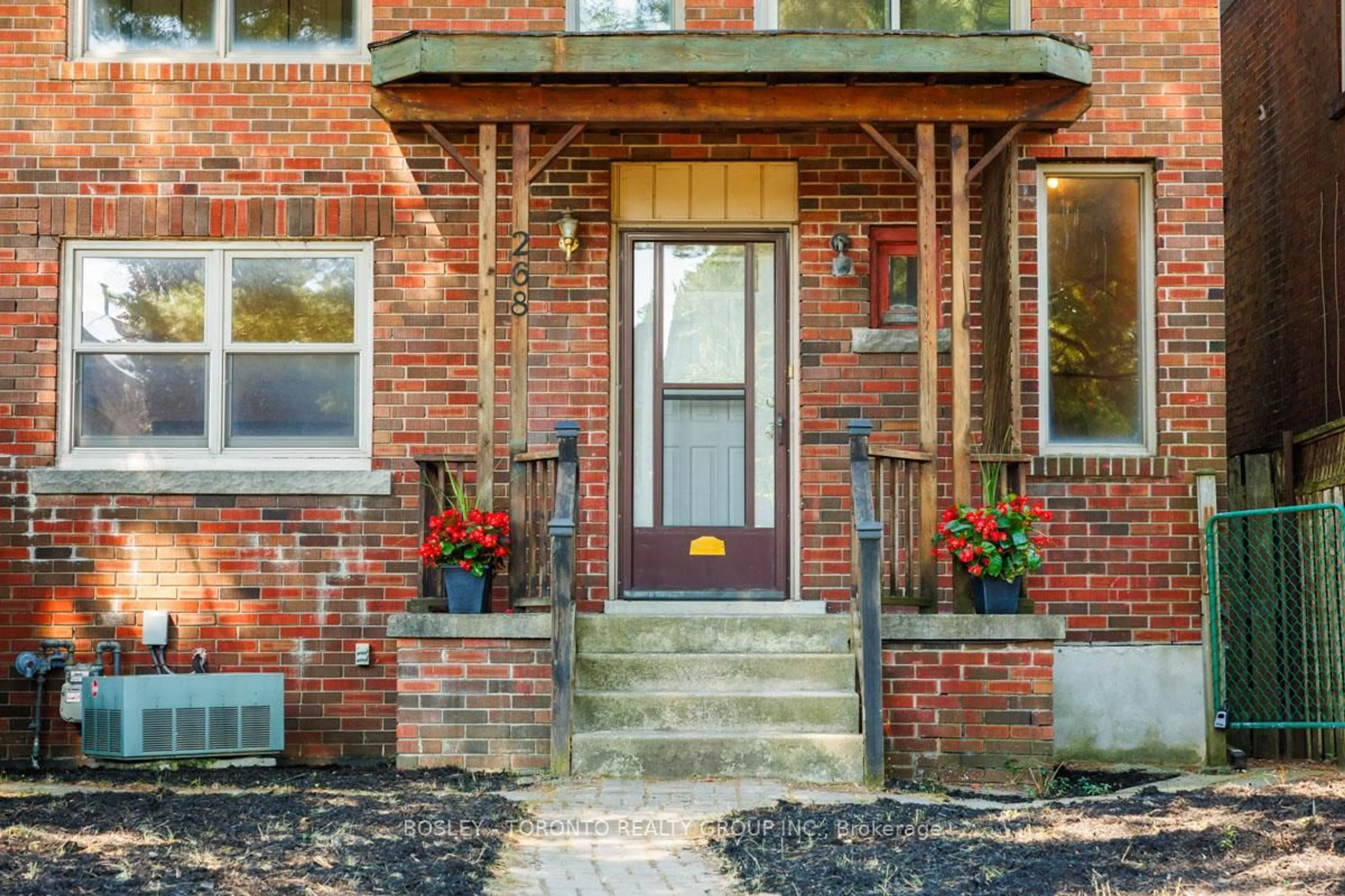 Home with brick exterior material, street for 268 Sutherland Dr, Toronto Ontario M4G 1J3