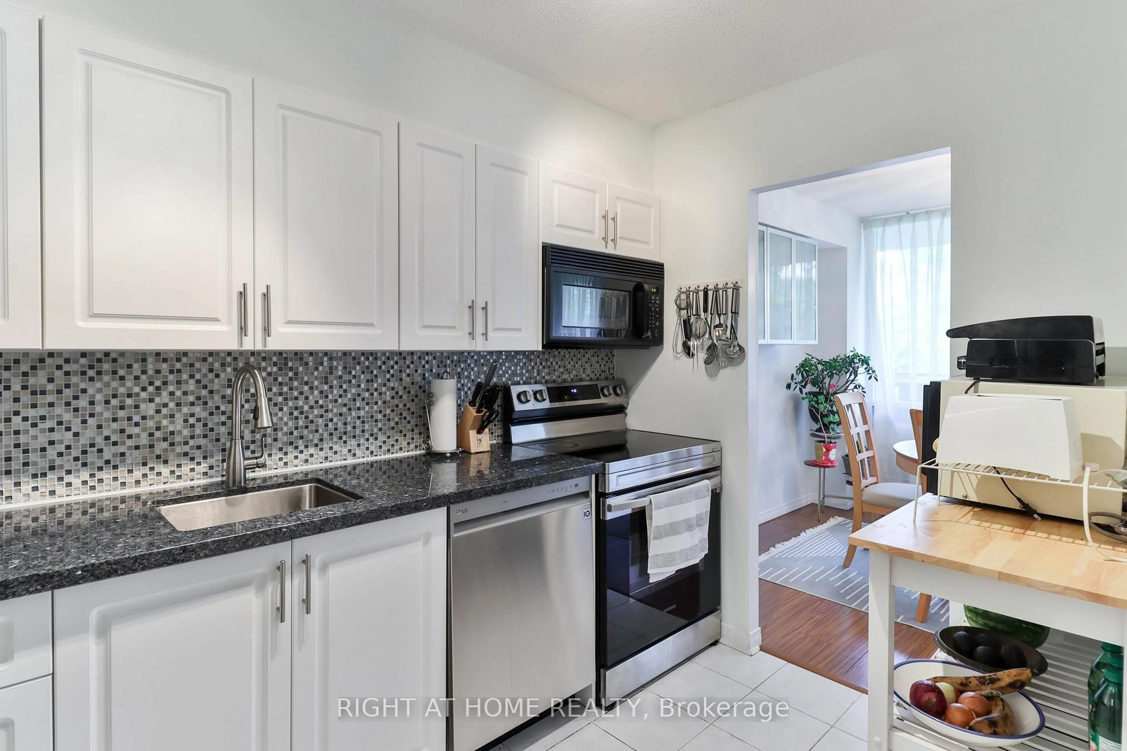 Standard kitchen, ceramic/tile floor for 10 Sunrise Ave #313, Toronto Ontario M4A 2R1