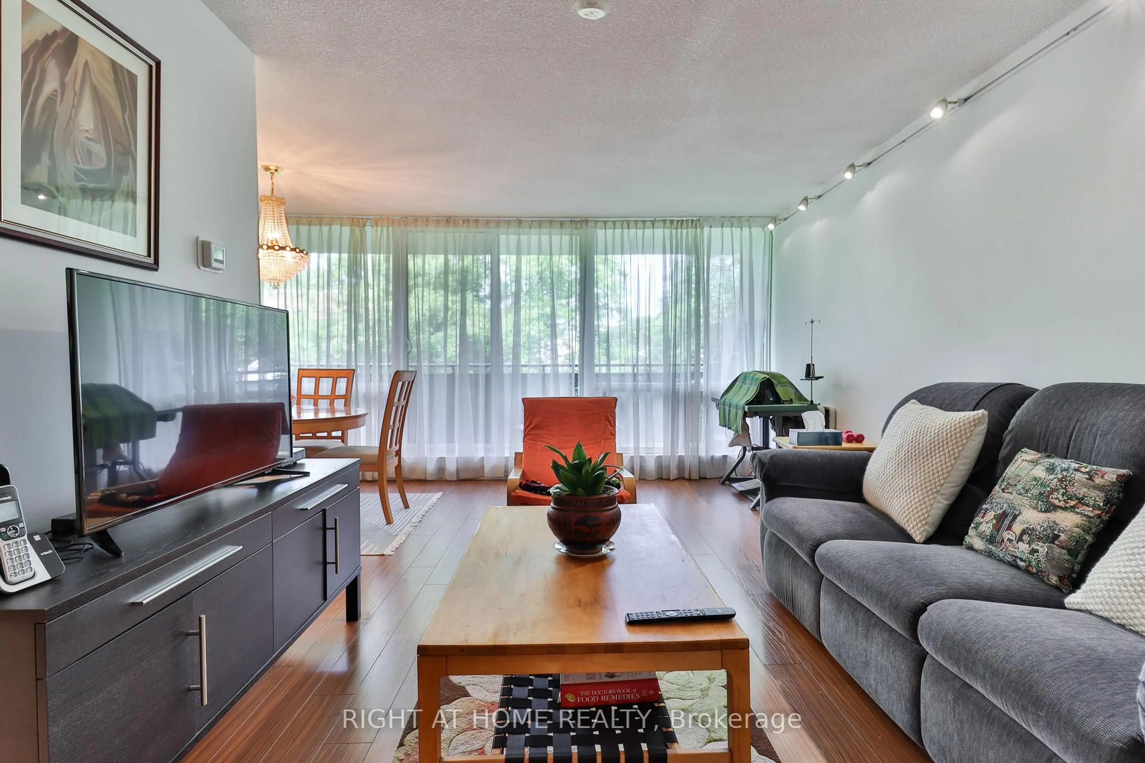 Living room with furniture, unknown for 10 Sunrise Ave #313, Toronto Ontario M4A 2R1