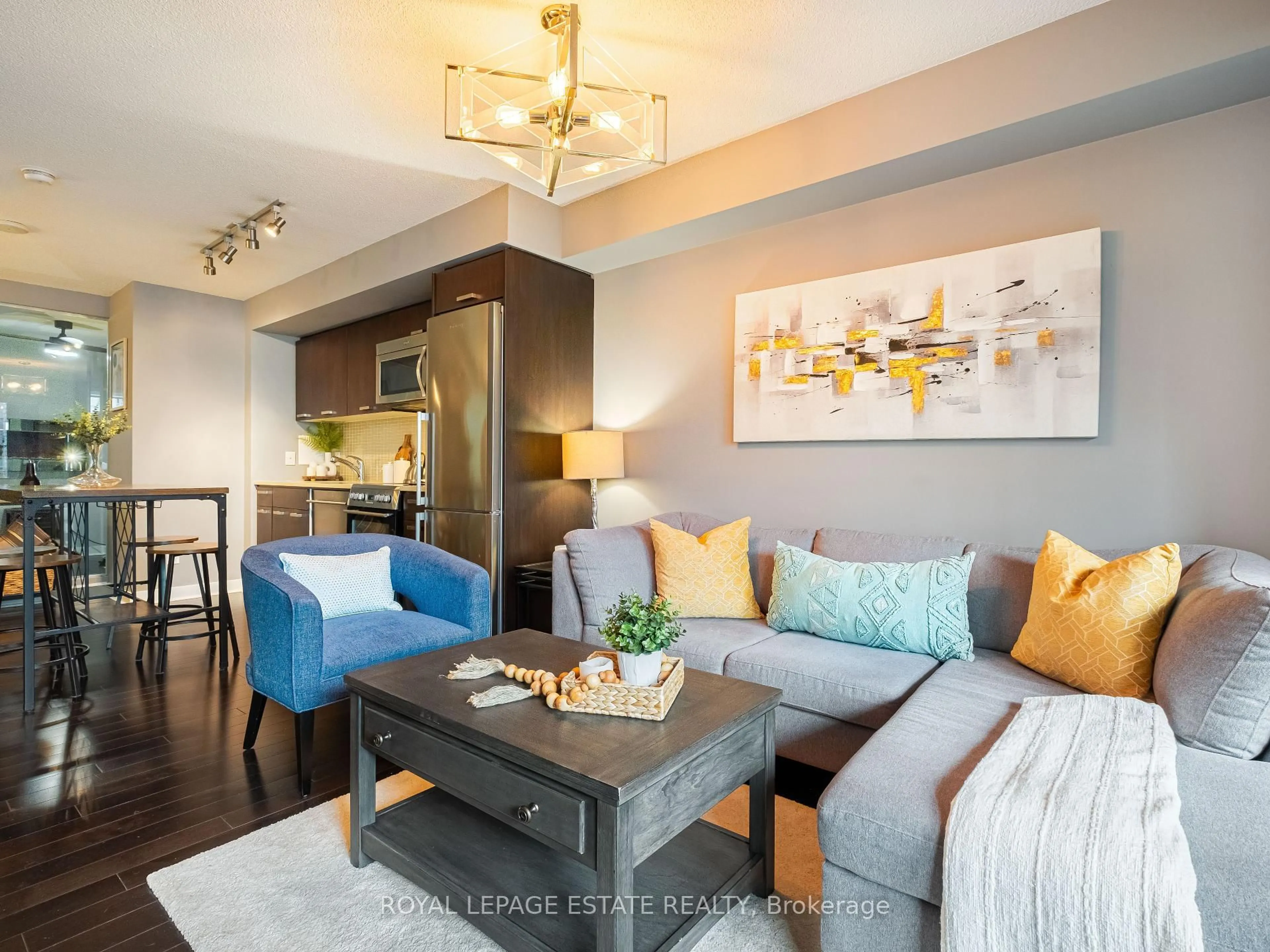 Living room with furniture, wood/laminate floor for 295 Adelaide St #313, Toronto Ontario M5V 0L4