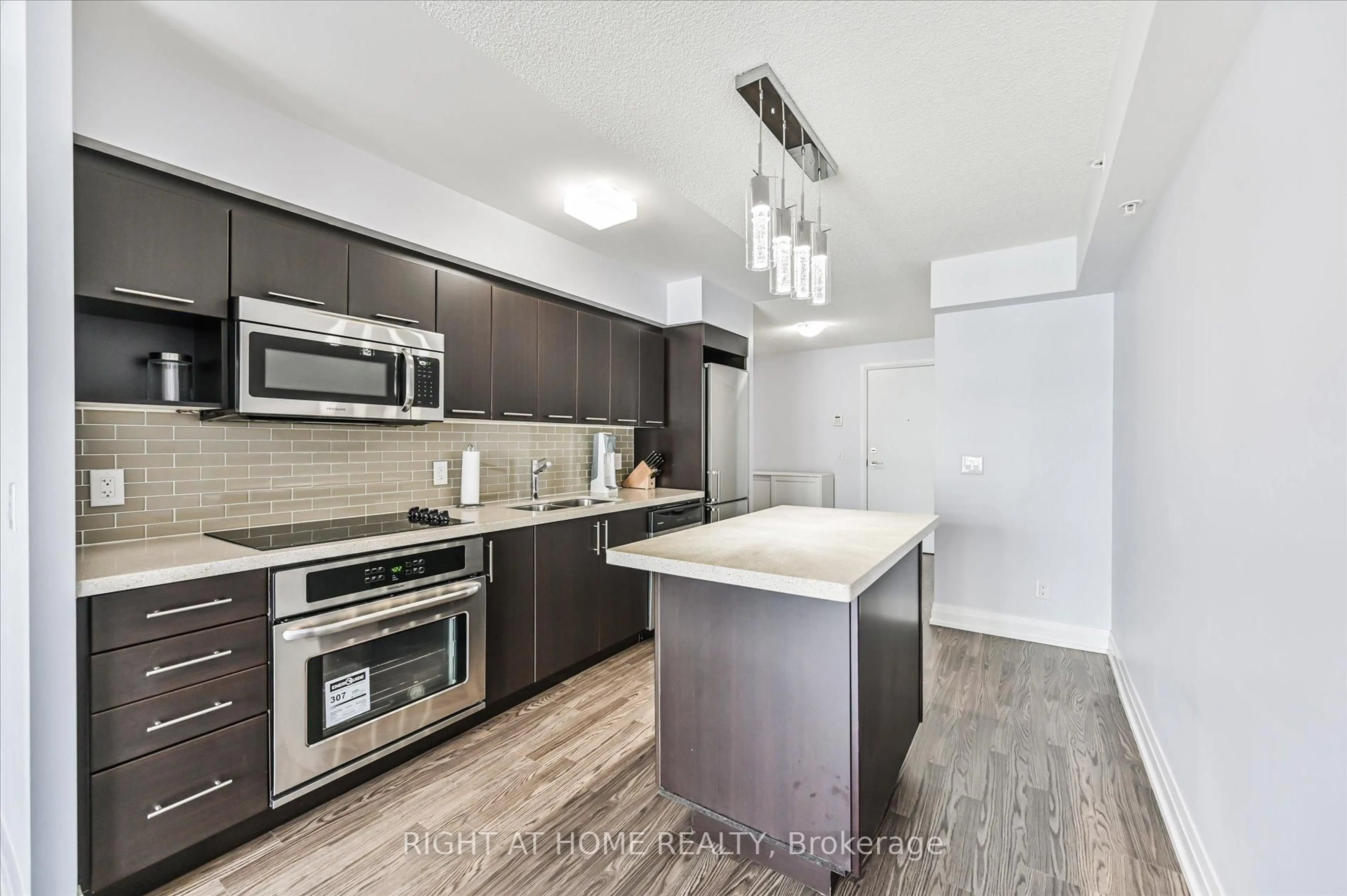 Open concept kitchen, unknown for 565 Wilson Ave #W1001, Toronto Ontario M3H 0C6