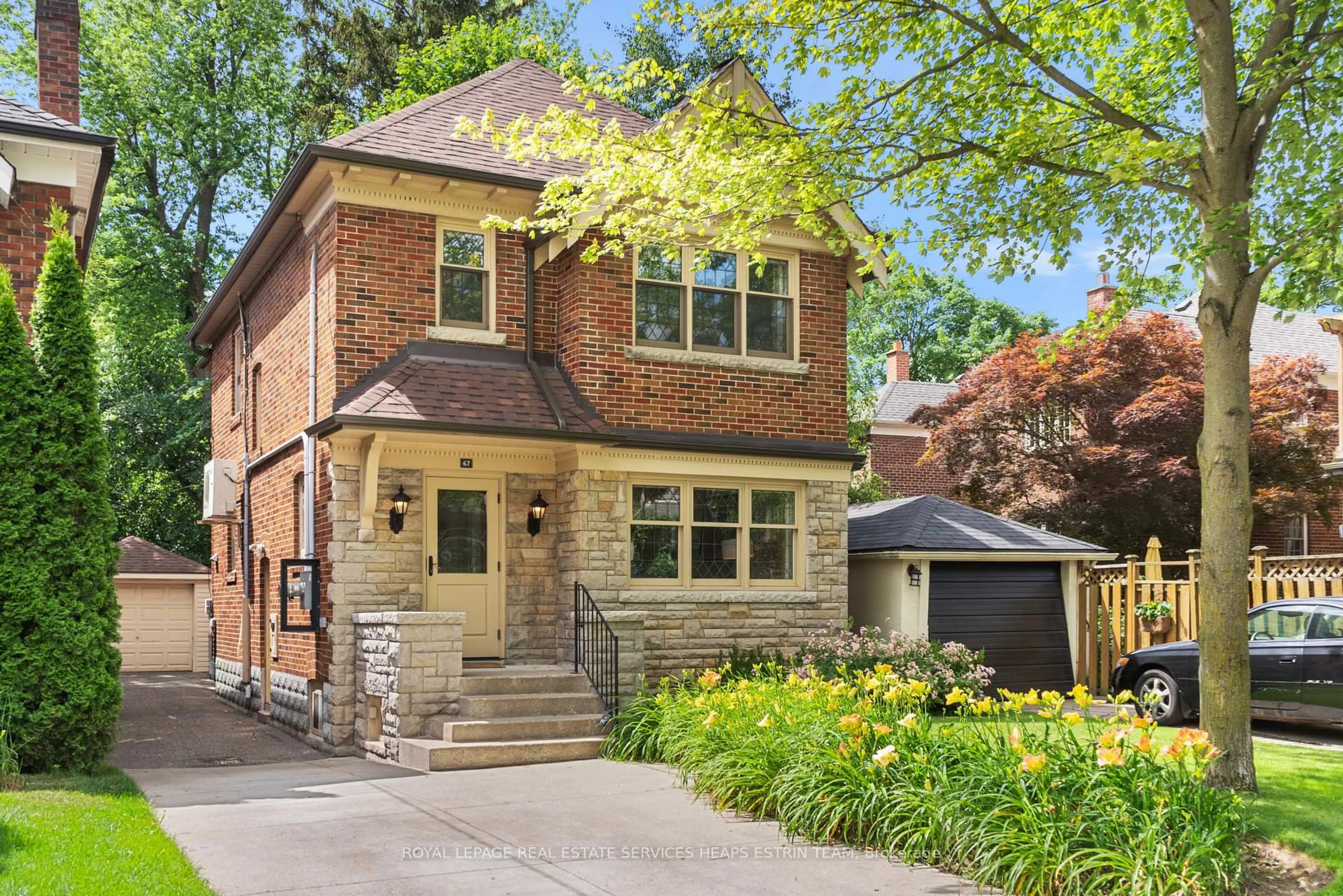 Home with brick exterior material, street for 67 Parkhurst Blvd, Toronto Ontario M4G 2E1