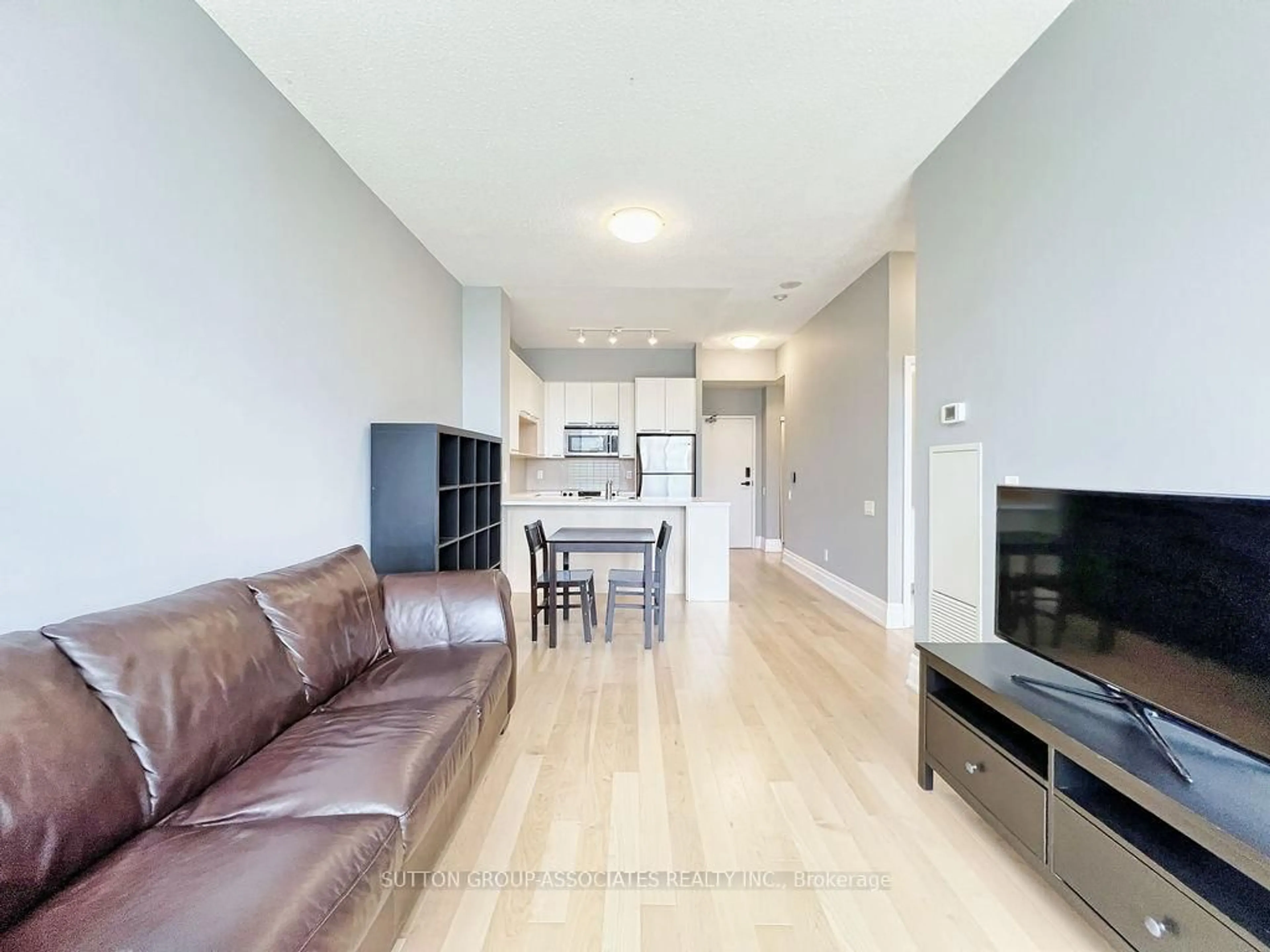 Living room with furniture, unknown for 21 Carlton St #1909, Toronto Ontario M5B 1L3