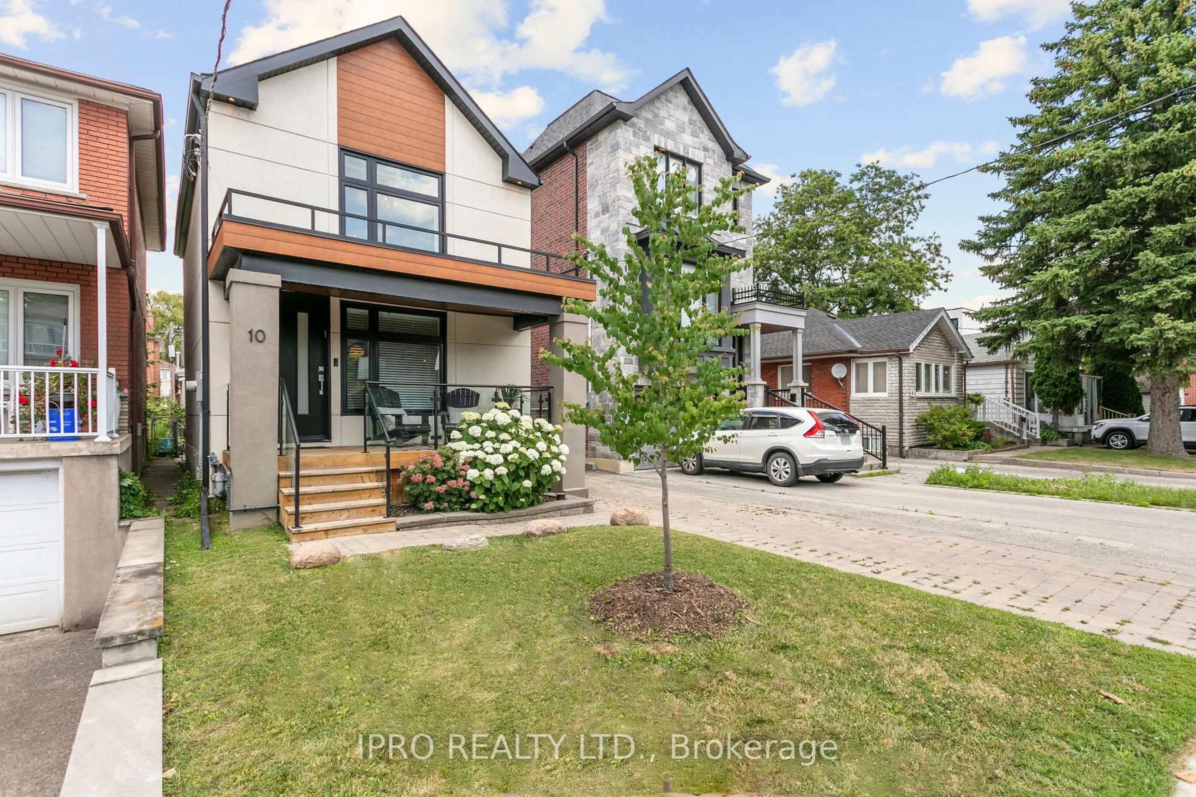 Home with brick exterior material, street for 10 Holland Park Ave, Toronto Ontario M6C 1M1