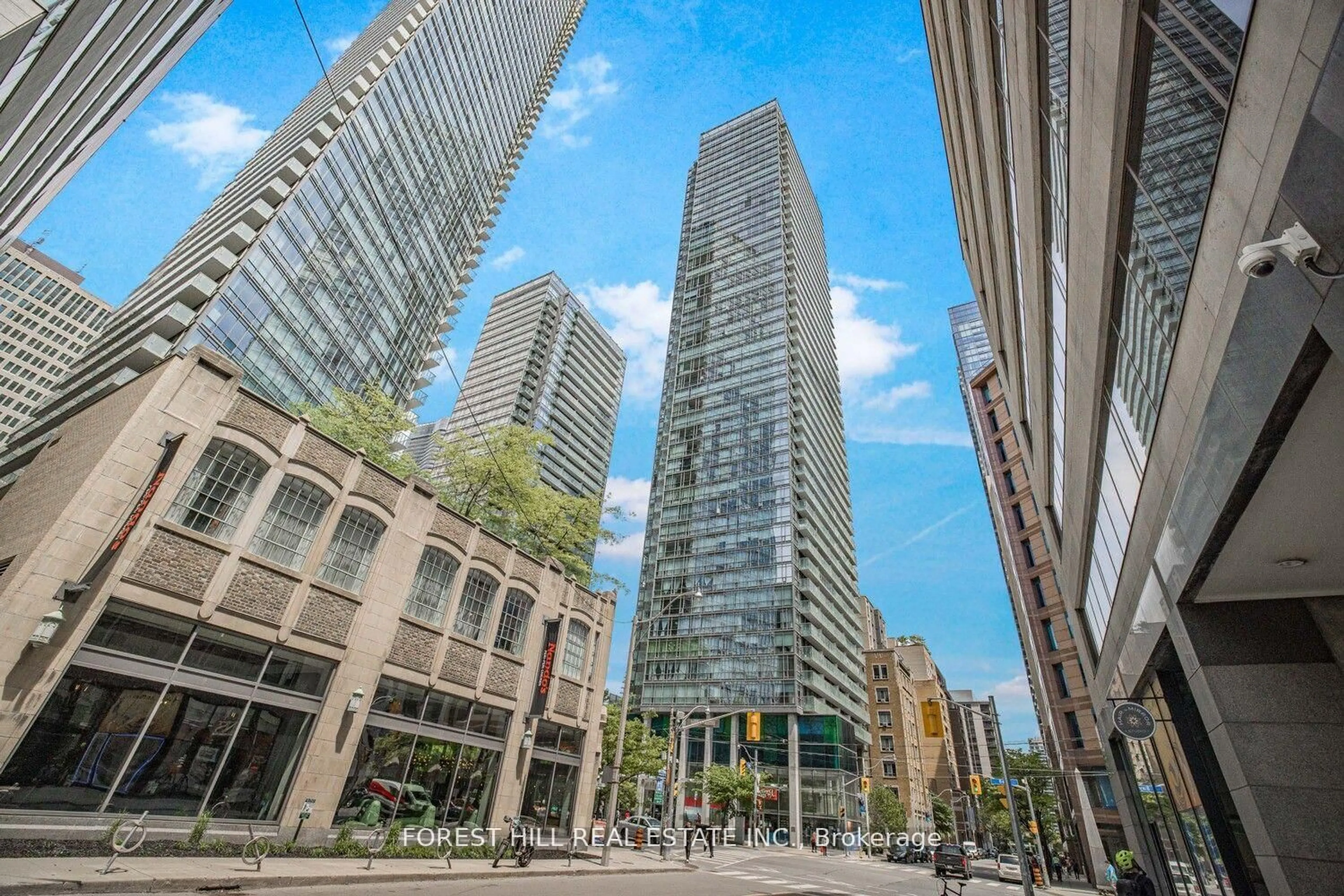Patio, city buildings view from balcony for 38 Grenville St #607, Toronto Ontario M4Y 1A5