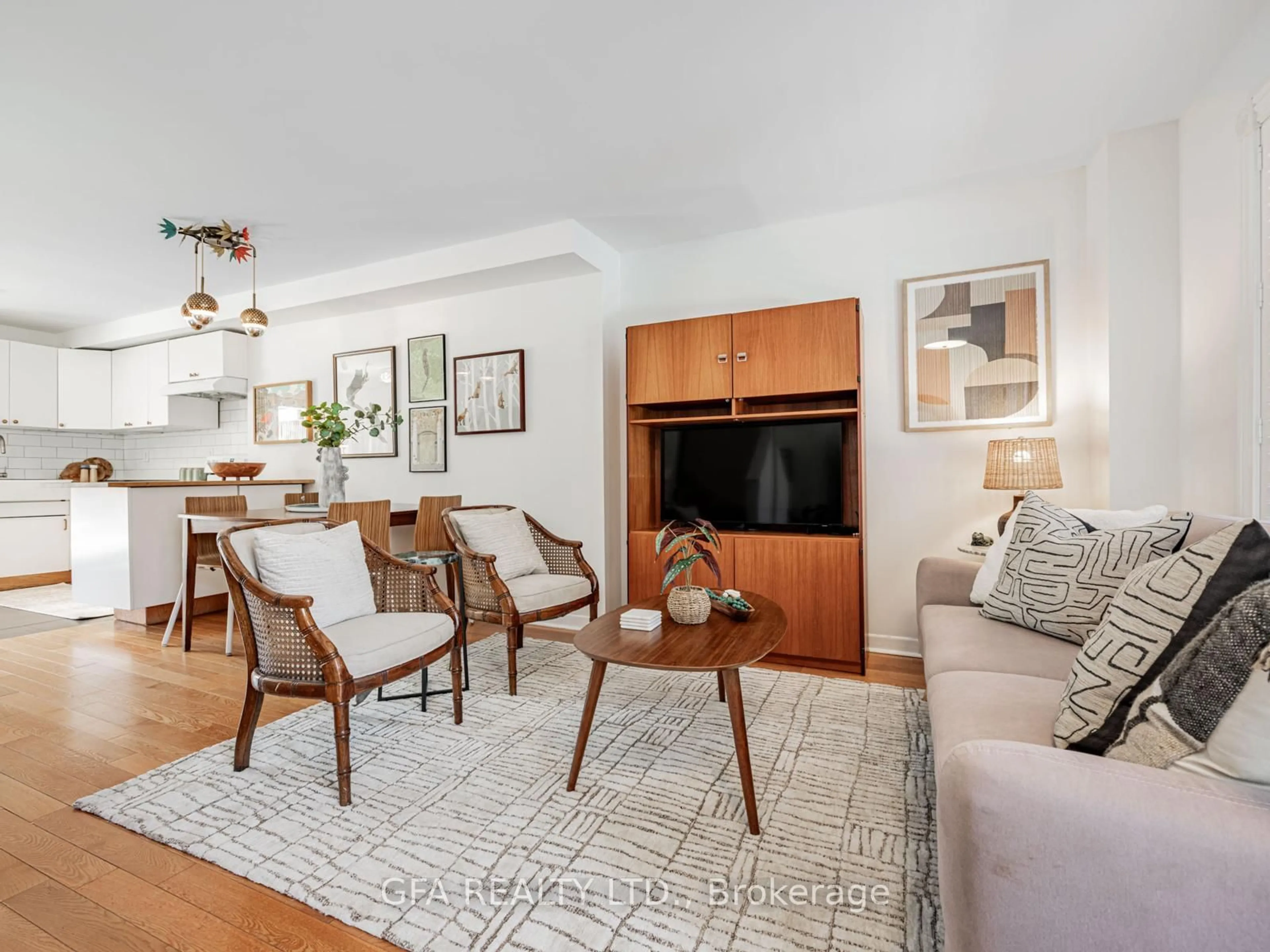 Living room with furniture, wood/laminate floor for 463 Melita Cres, Toronto Ontario M6G 3X9