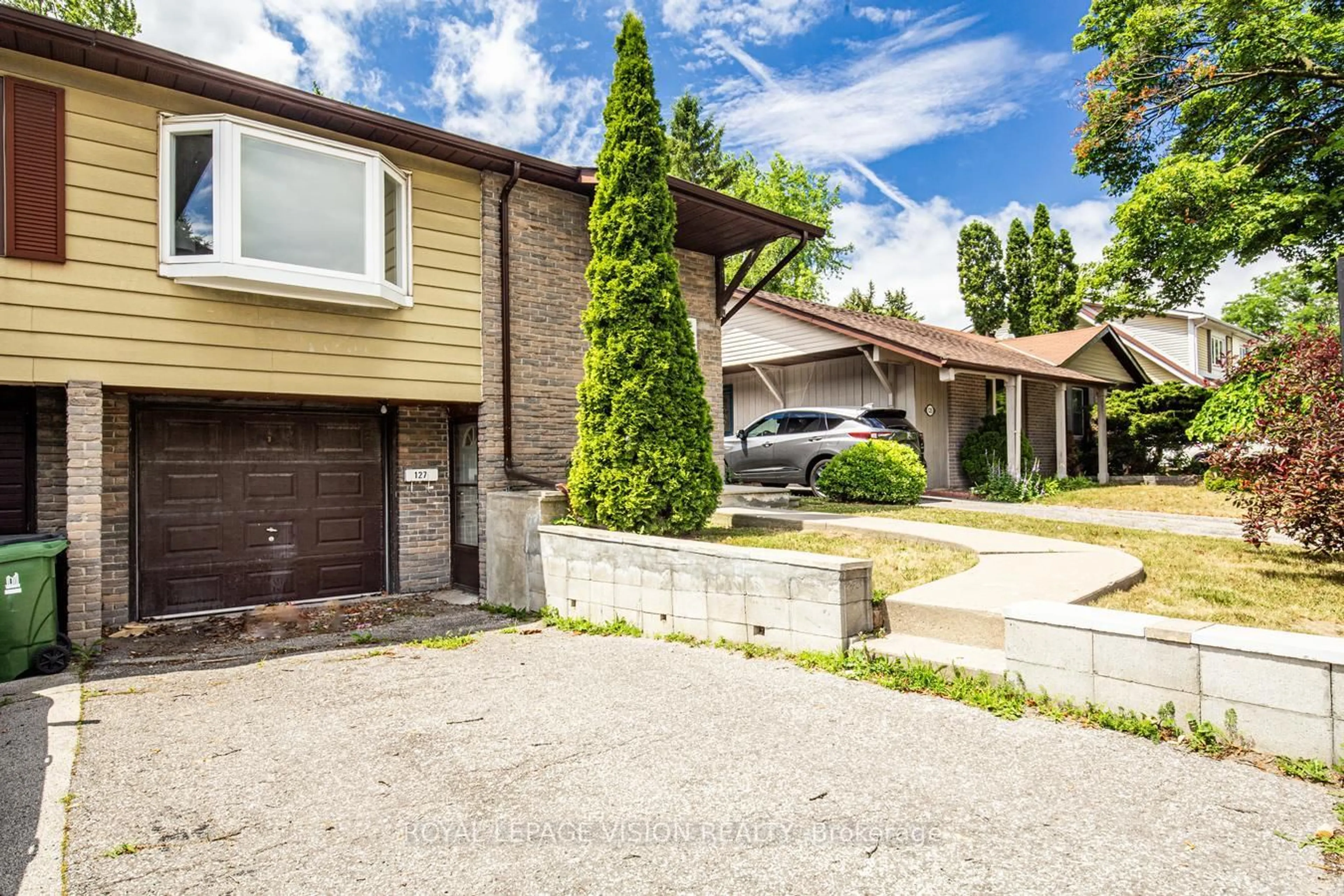 Home with brick exterior material, street for 127 Freshmeadow Dr, Toronto Ontario M2H 2P9