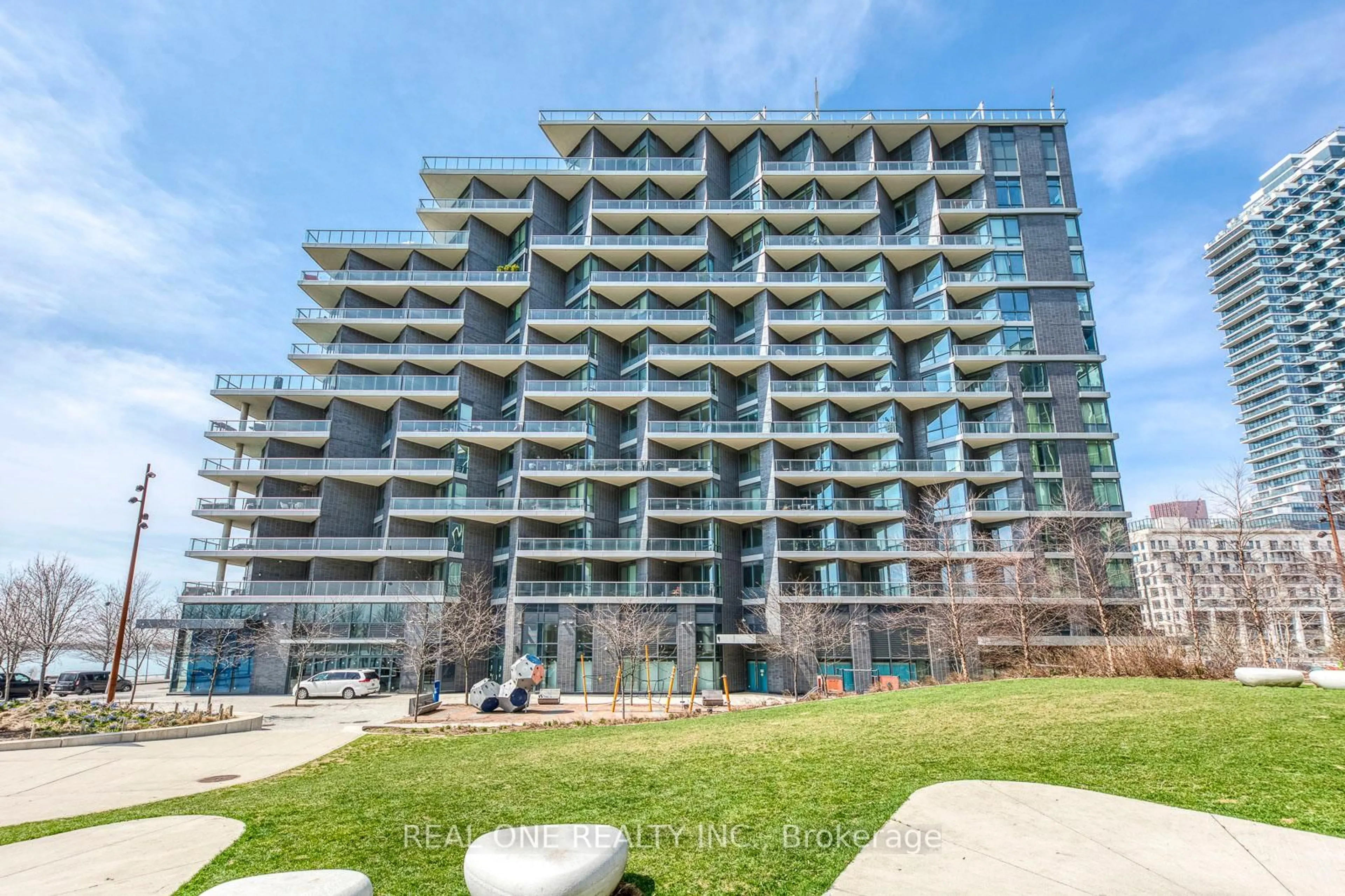 A pic from outside/outdoor area/front of a property/back of a property/a pic from drone, building for 1 Edgewater Dr #612, Toronto Ontario M5A 0L1