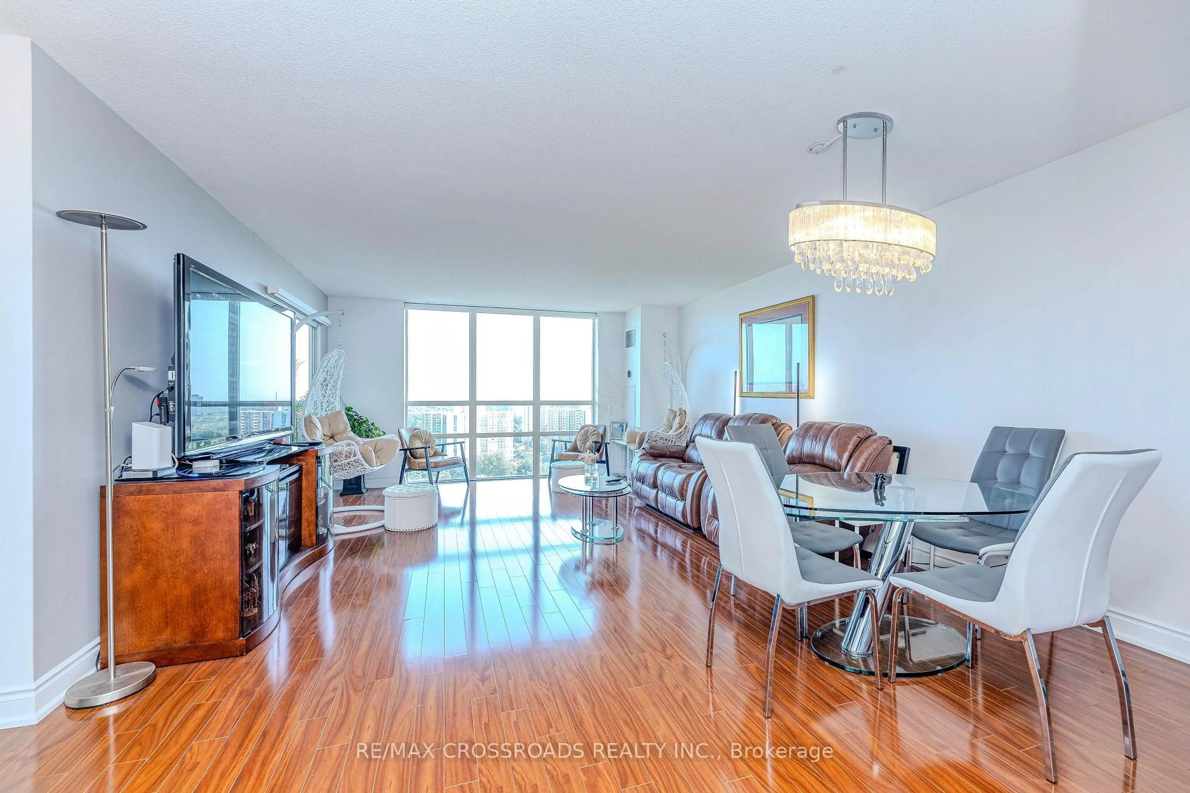 Living room with furniture, wood/laminate floor for 205 Wynford Dr #2004, Toronto Ontario M3C 3P4