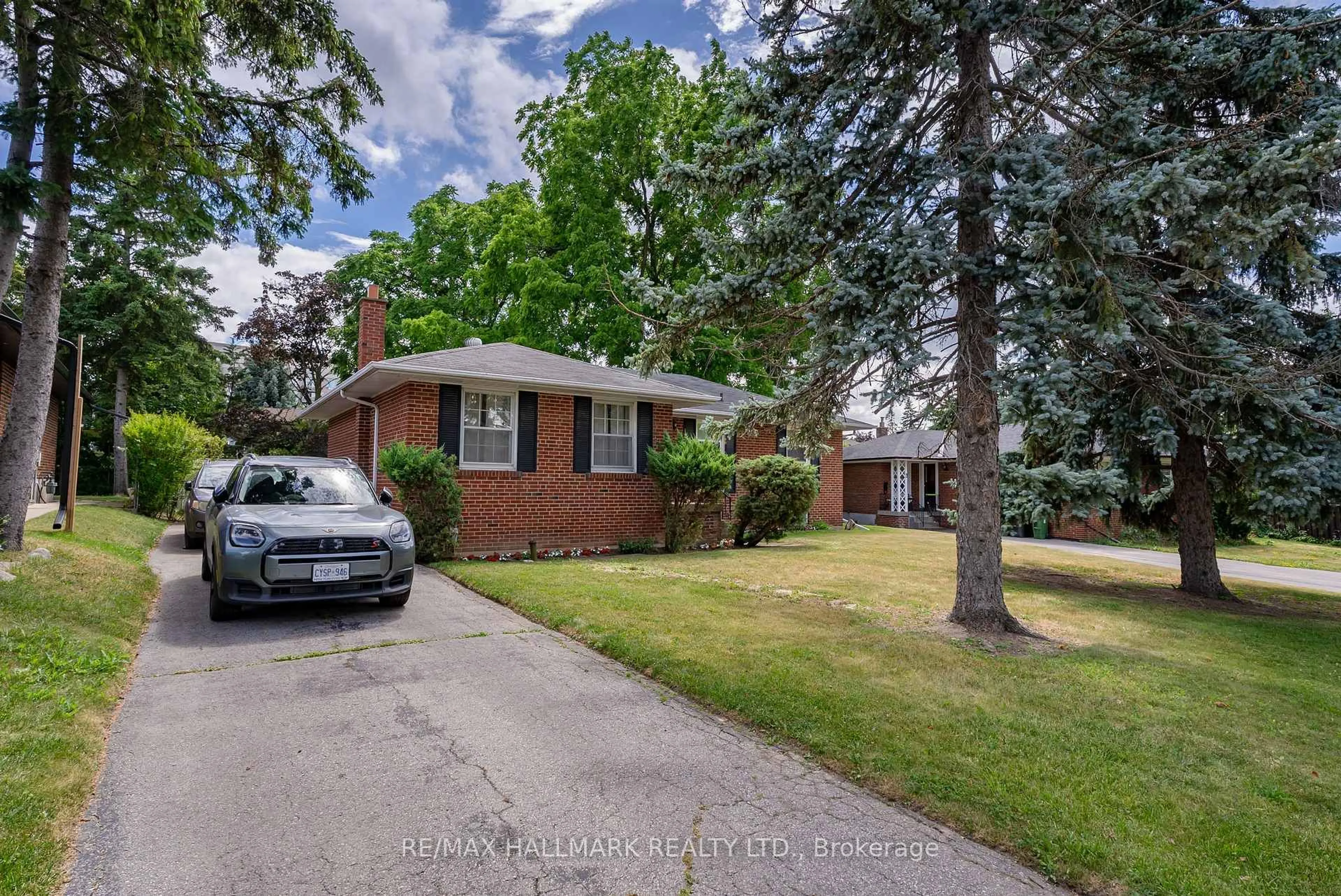Home with brick exterior material, street for 5 Tinder Cres, Toronto Ontario M4A 1L2