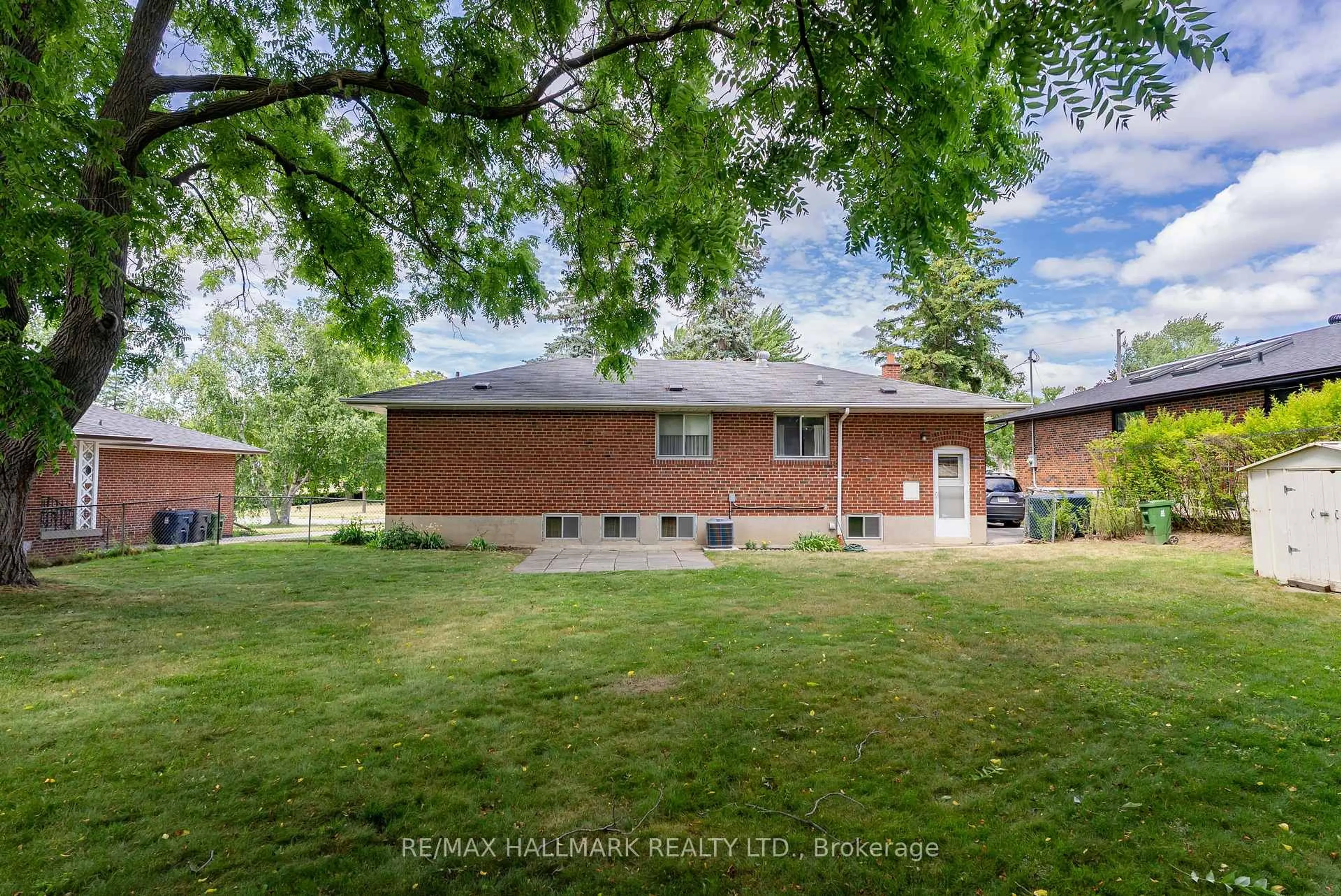 Home with brick exterior material, street for 5 Tinder Cres, Toronto Ontario M4A 1L2