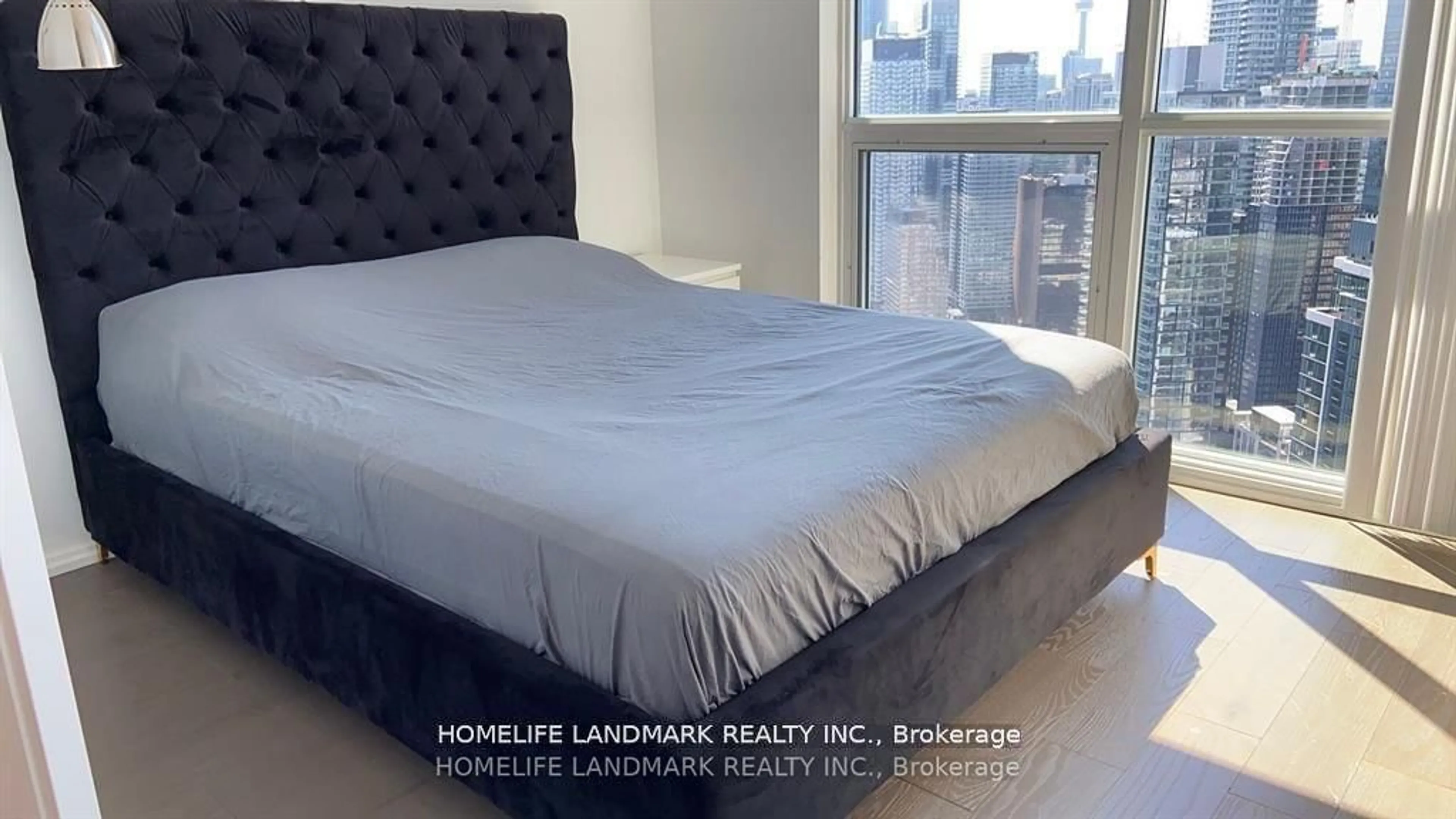 Bedroom with bed, wood/laminate floor for 45 Charles St #5202, Toronto Ontario M4Y 0B8