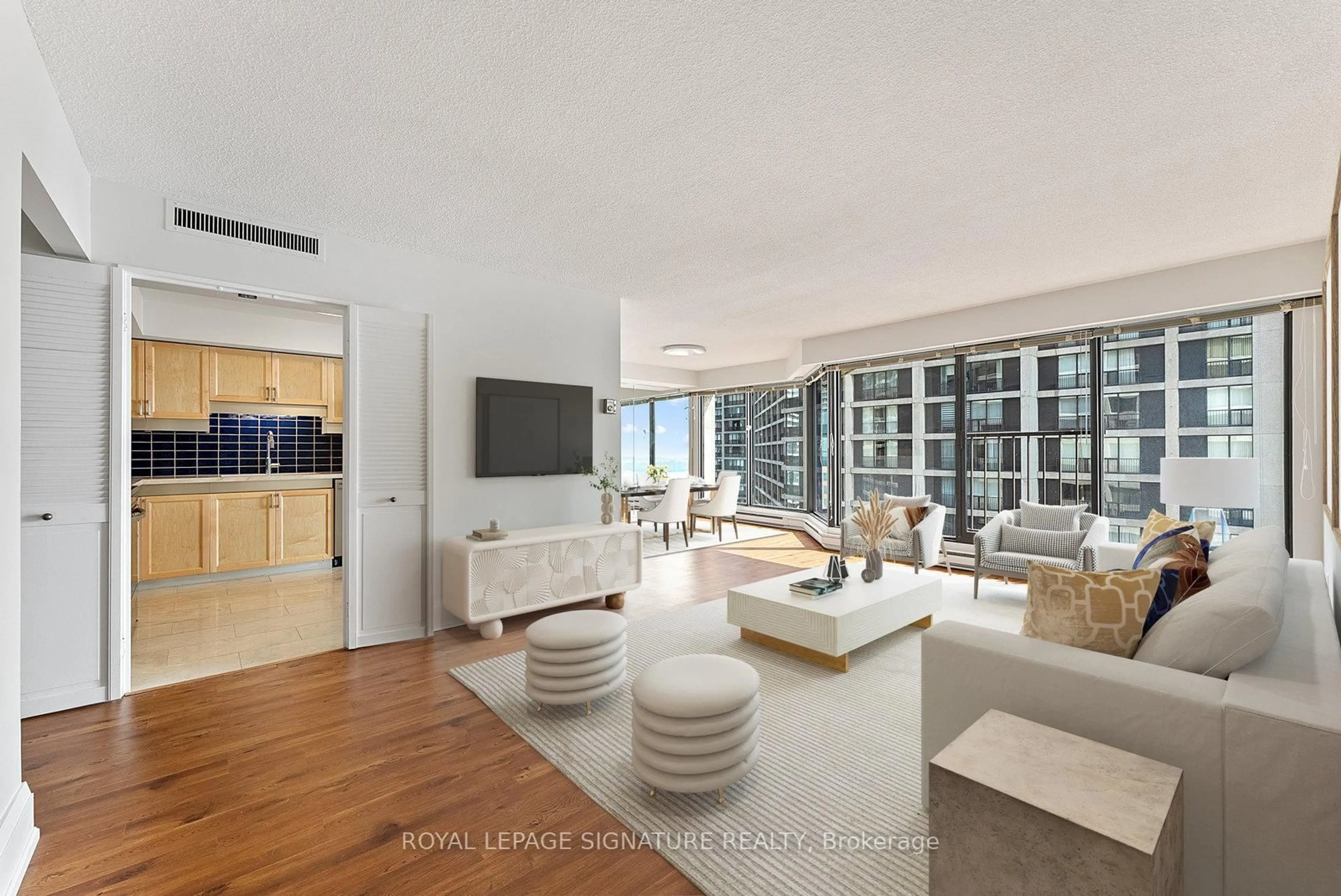 Living room with furniture, unknown for 65 Harbour Sq #2603, Toronto Ontario M5J 2L4