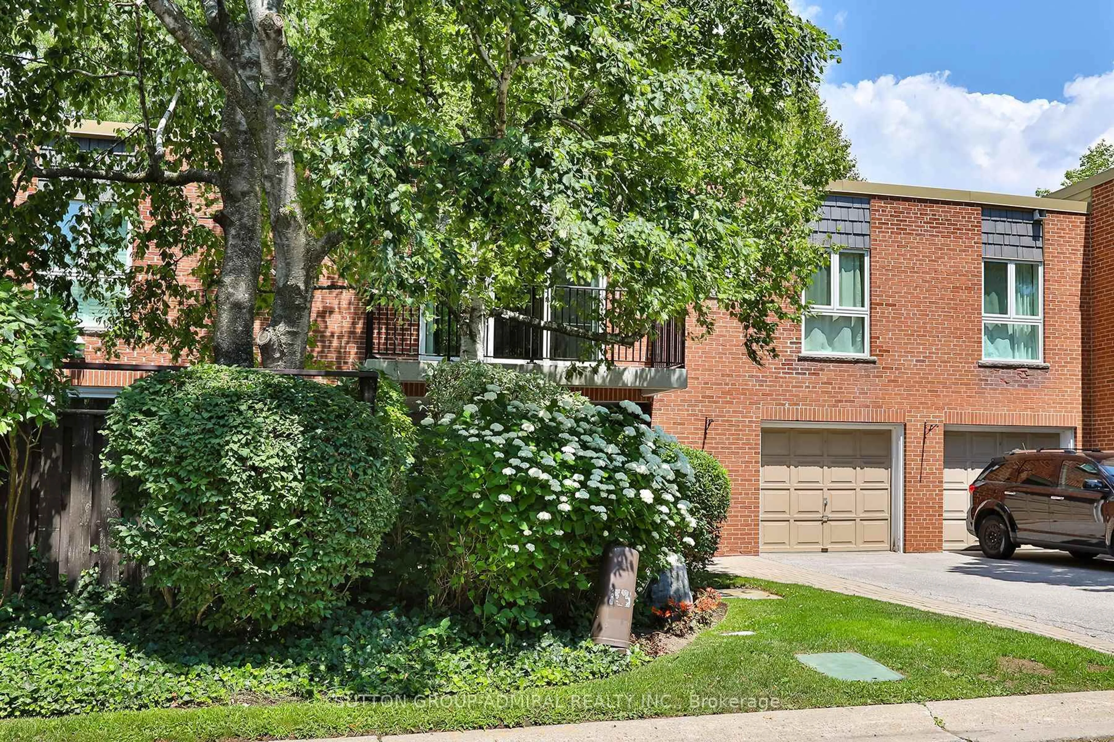 Home with brick exterior material, street for 6 Snowshoe Mill Way #206, Toronto Ontario M2L 1T5