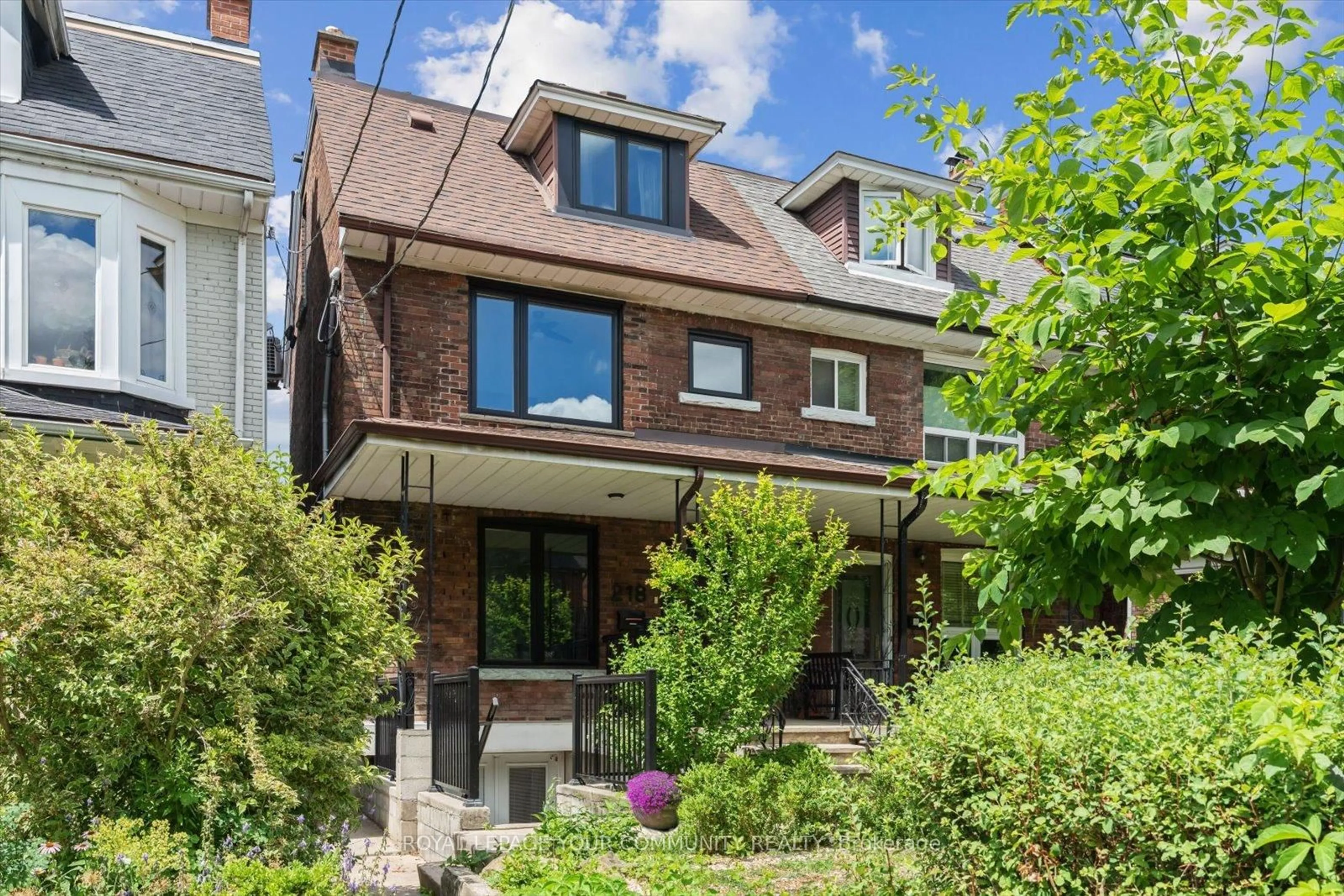 Home with brick exterior material, street for 218 Beatrice St, Toronto Ontario M6G 3G1