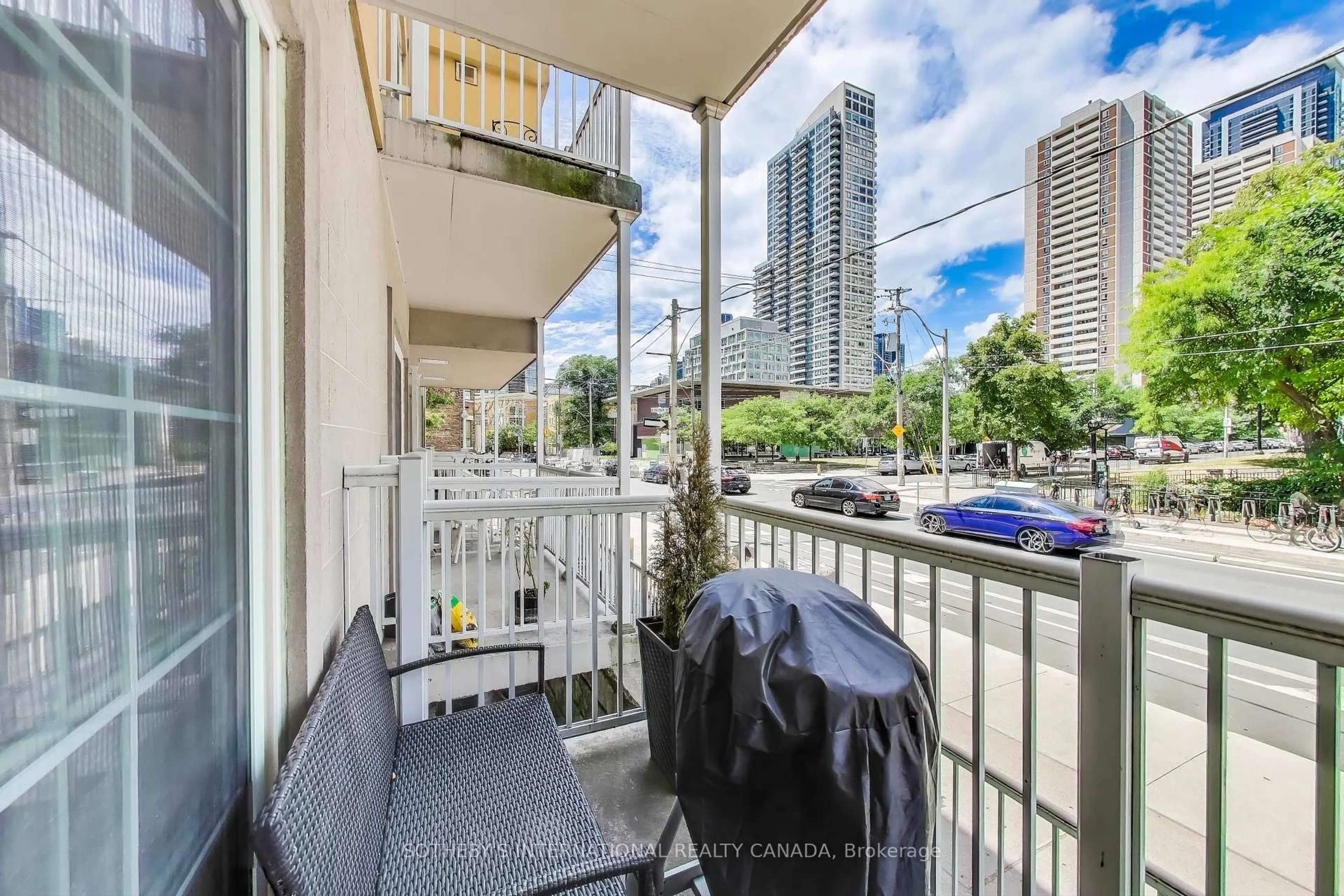 Balcony in the apartment, city buildings view from balcony for 207 Wellesley St #207, Toronto Ontario M4X 1G1