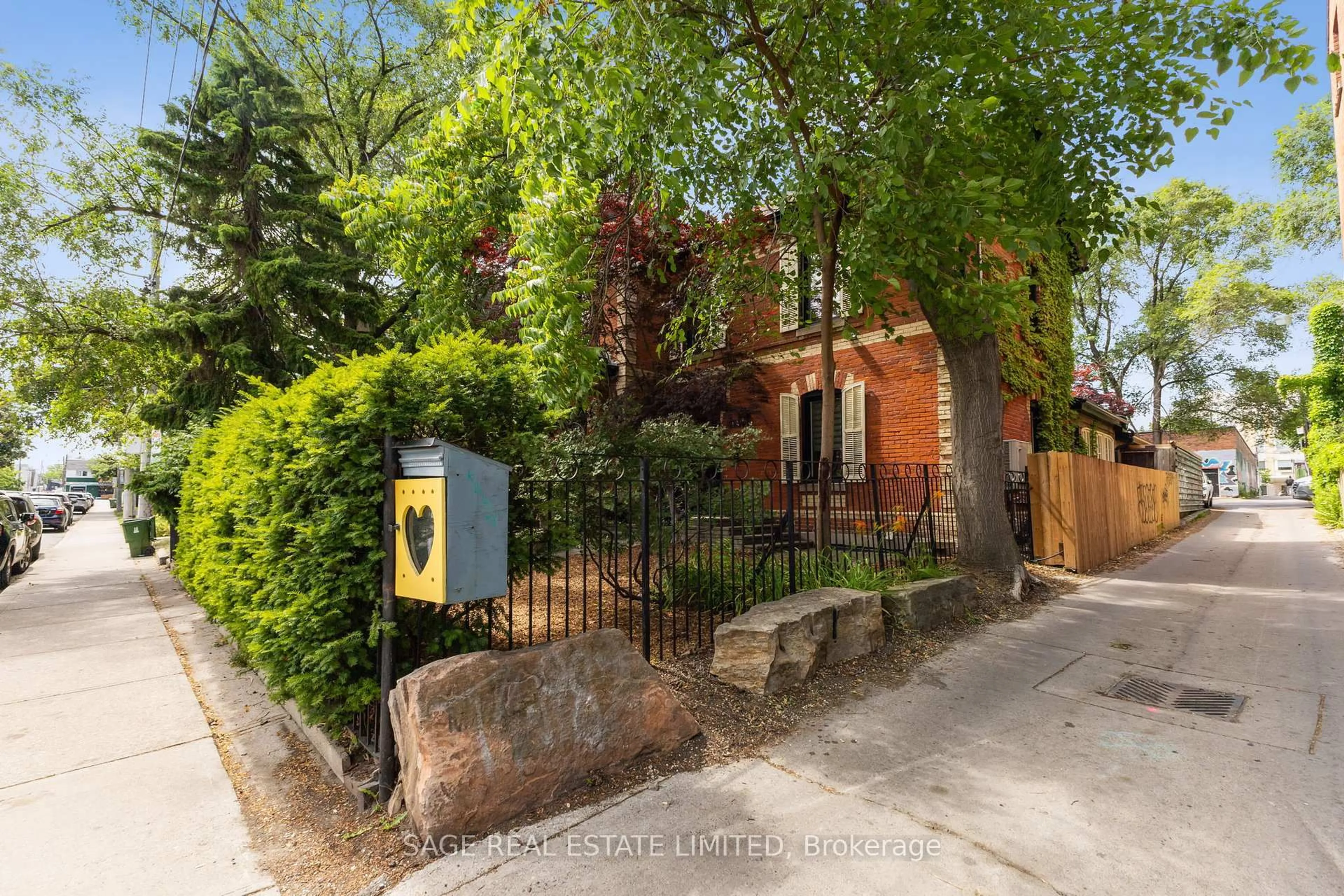 Home with brick exterior material, street for 14 Halton St, Toronto Ontario M6J 1R3