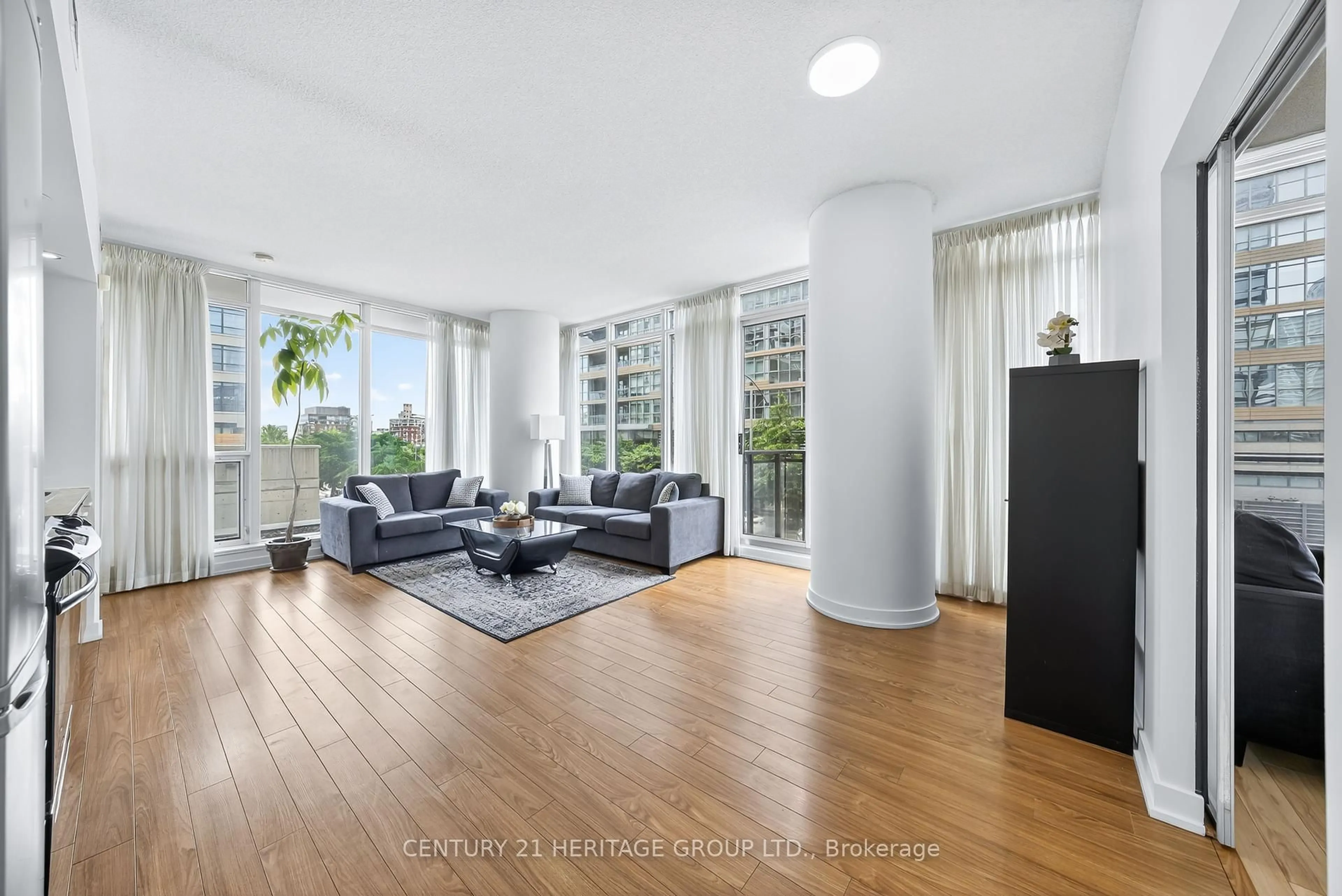 Living room with furniture, unknown for 25 Capreol Crt #206, Toronto Ontario M5V 3Z7