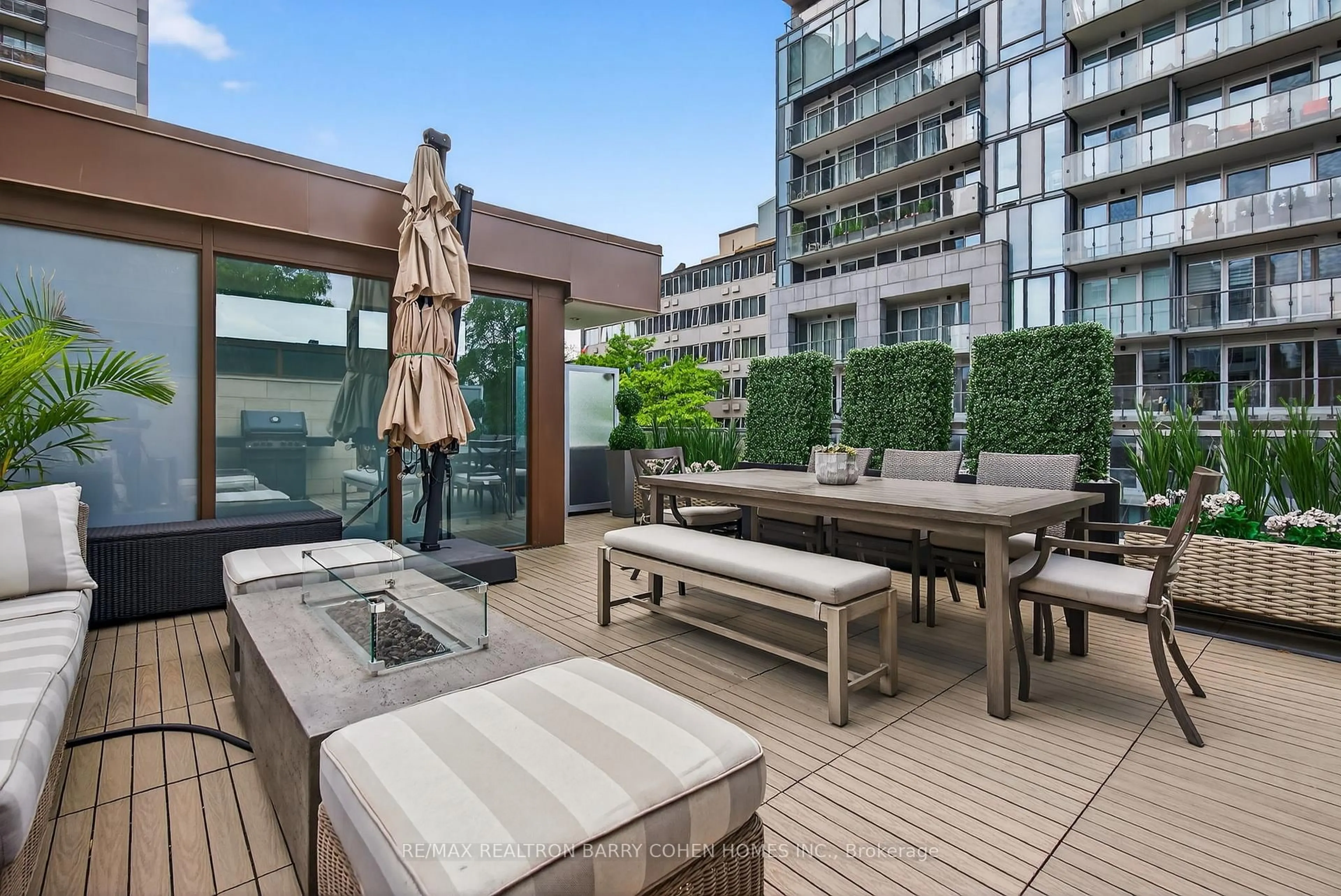 Patio, city buildings view from balcony for 133 Pears Ave, Toronto Ontario M5R 1T3