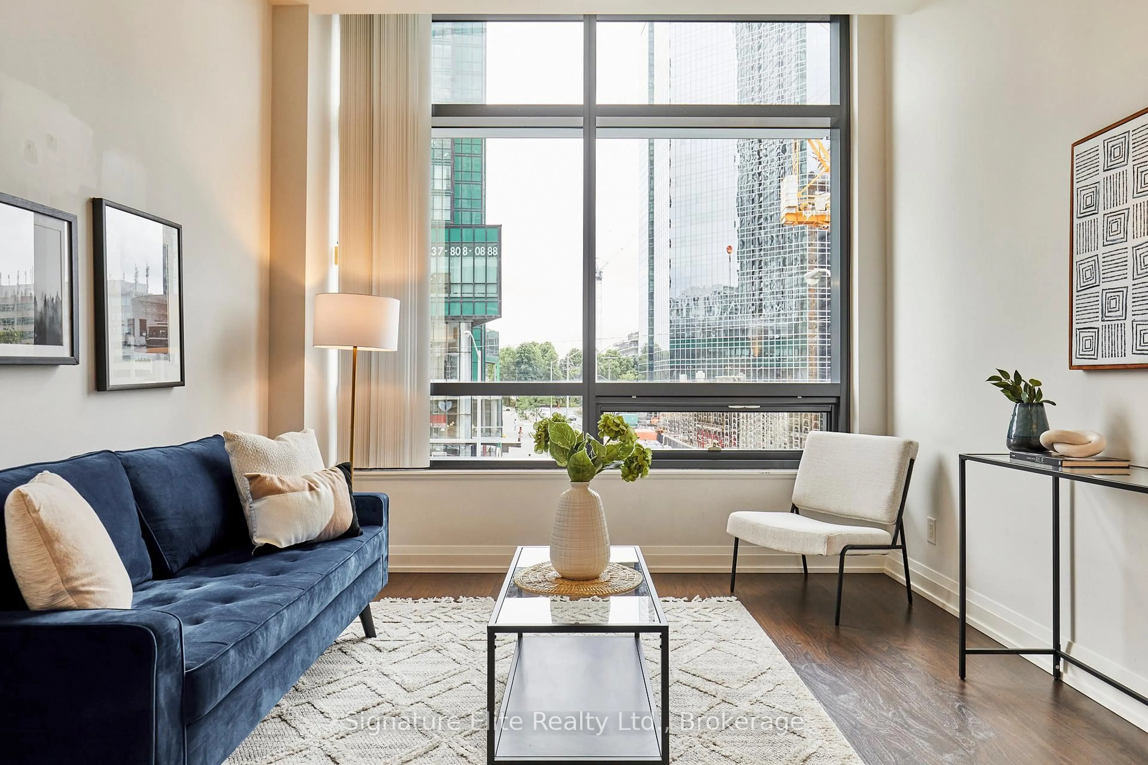 Living room with furniture, unknown for 2 Anndale Dr #203, Toronto Ontario M2N 0G5