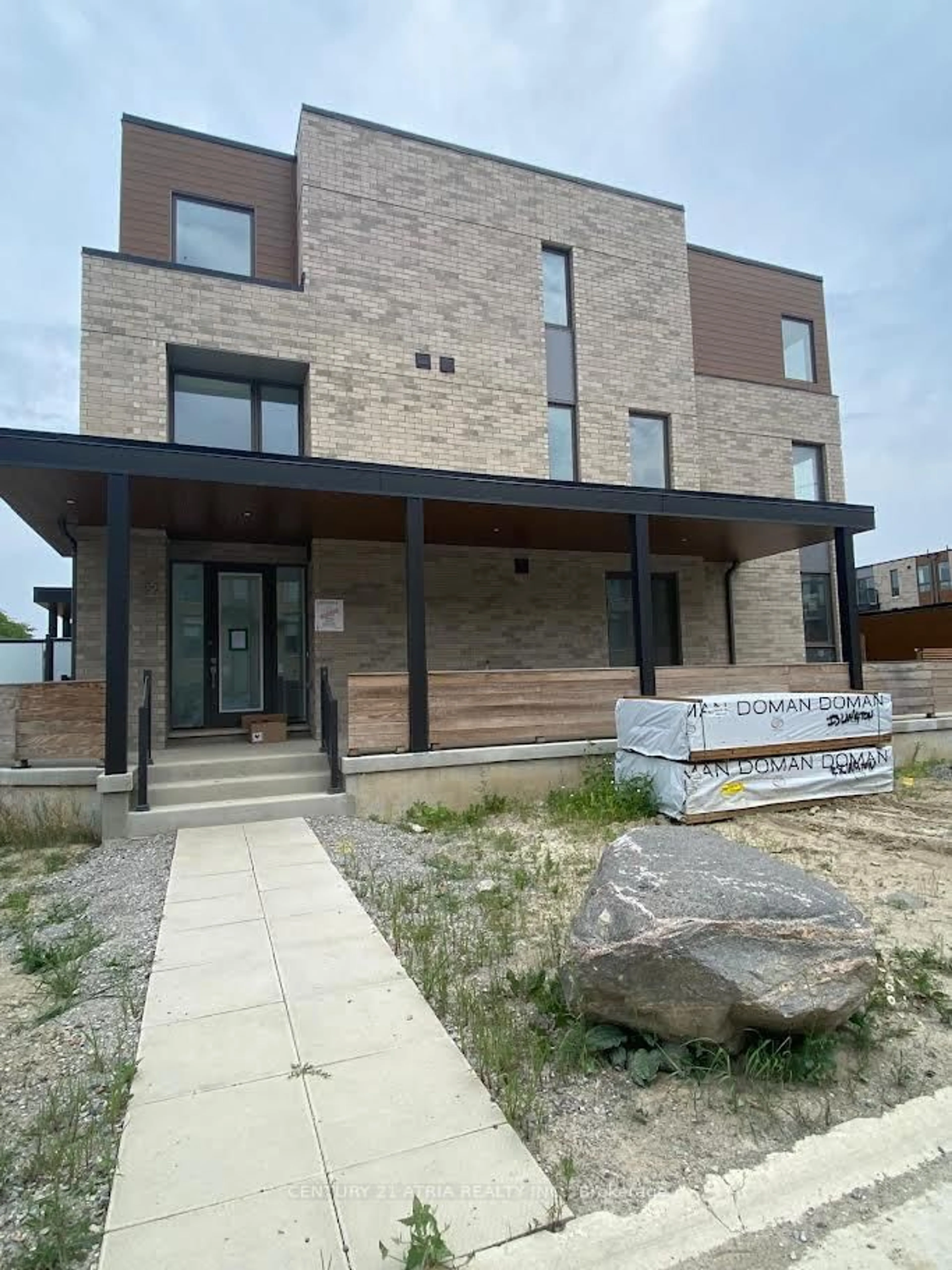 Home with brick exterior material, building for 55 Hooyo Terr, Toronto Ontario M6A 0G1