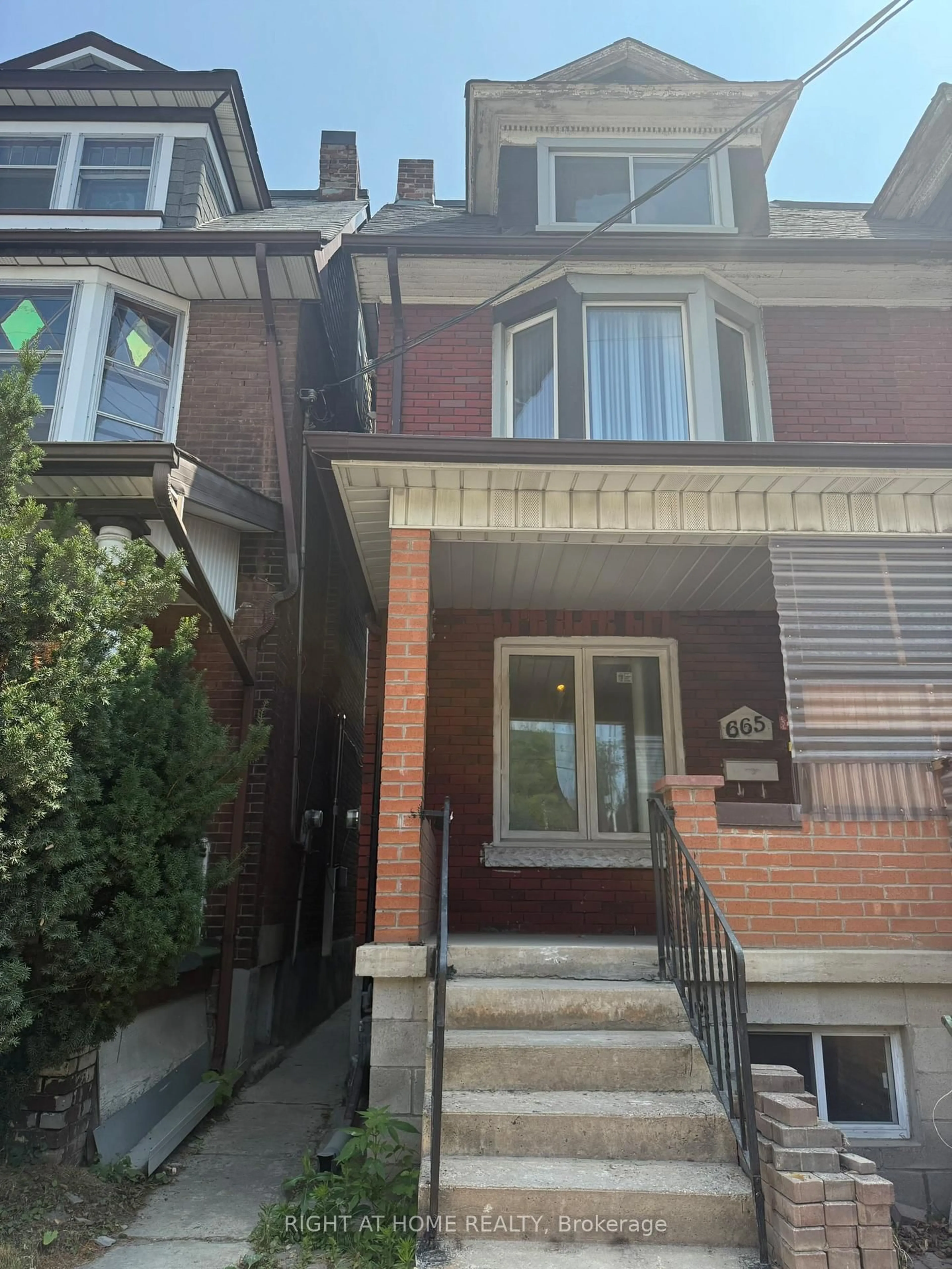 Home with brick exterior material, street for 665 Ossington Ave, Toronto Ontario M6G 3T6