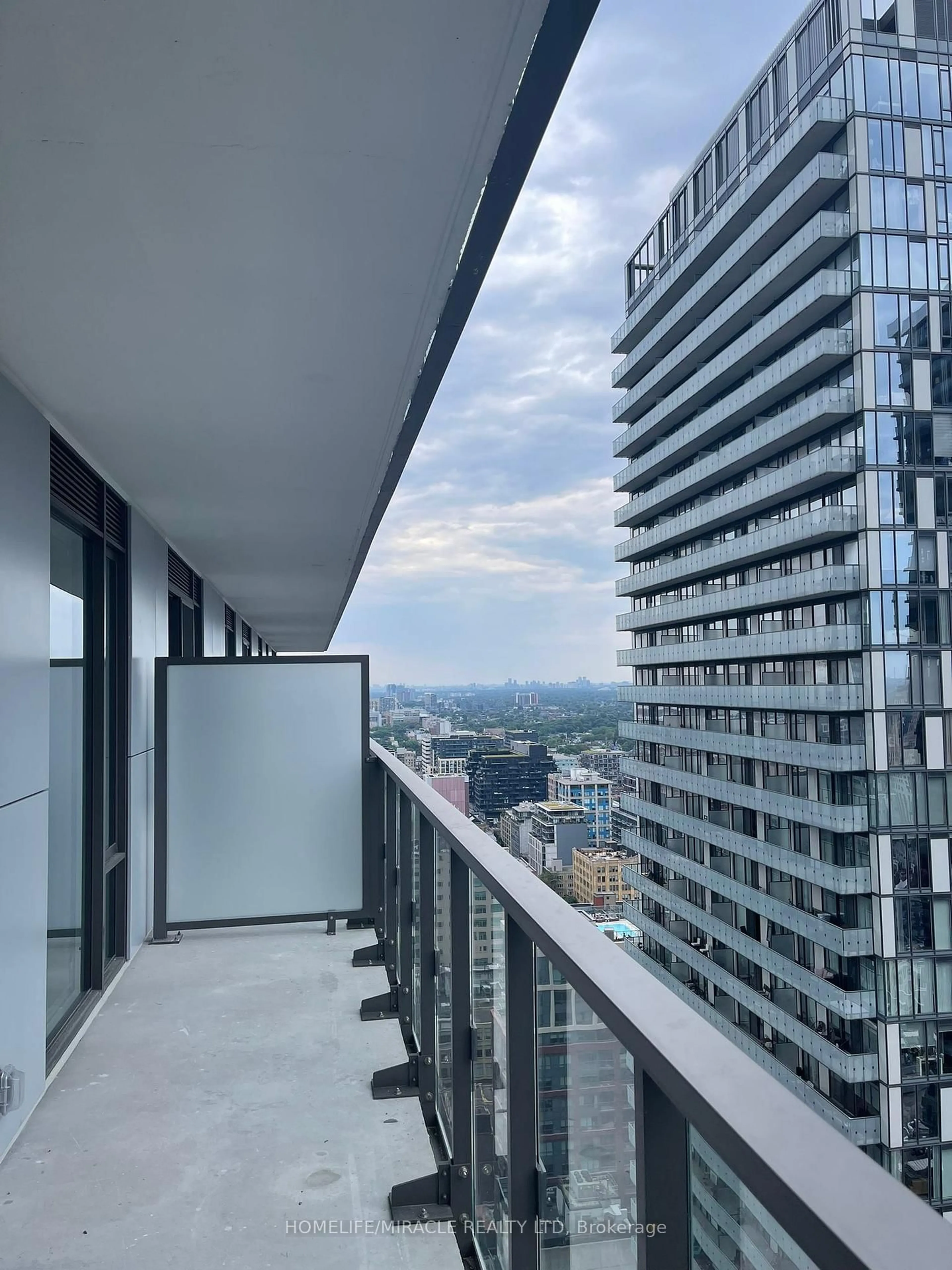 Balcony in the apartment, city buildings view from balcony for 28 Widmer St #3528, Toronto Ontario M5V 2E7
