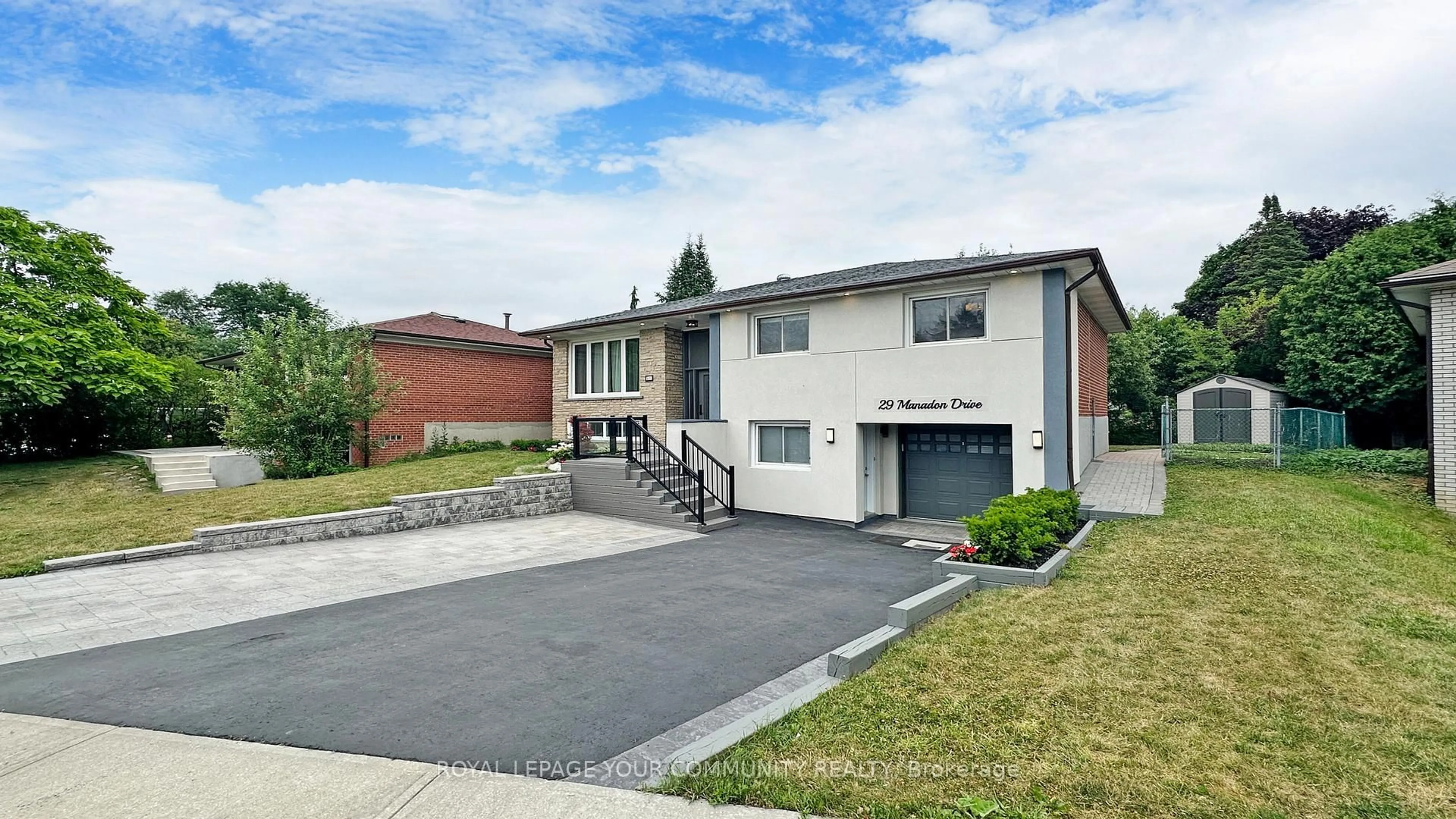 Home with brick exterior material, street for 29 Manadon Dr, Toronto Ontario M2M 1W8