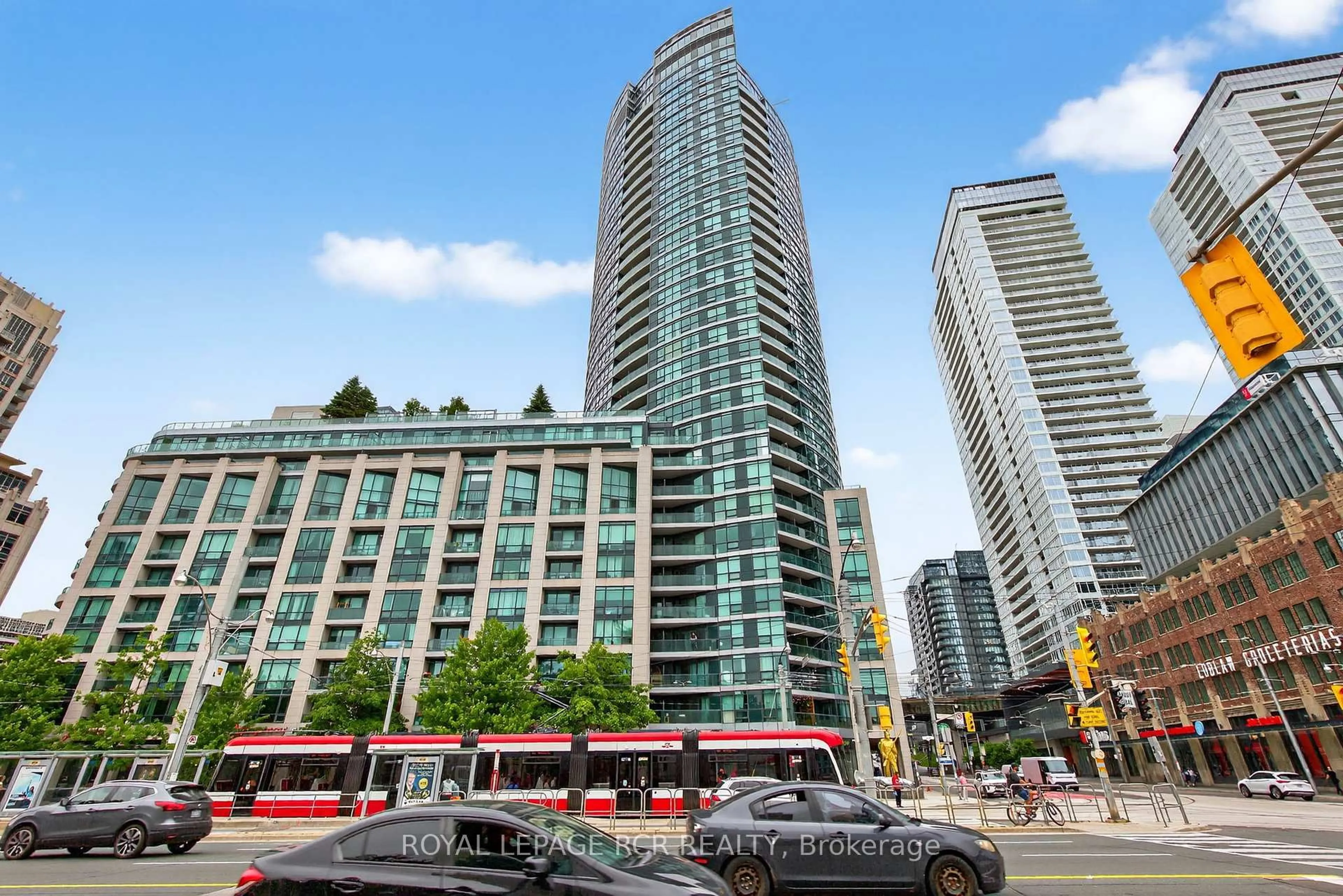 Patio, city buildings view from balcony for 600 Fleet St #310, Toronto Ontario M5V 1B7