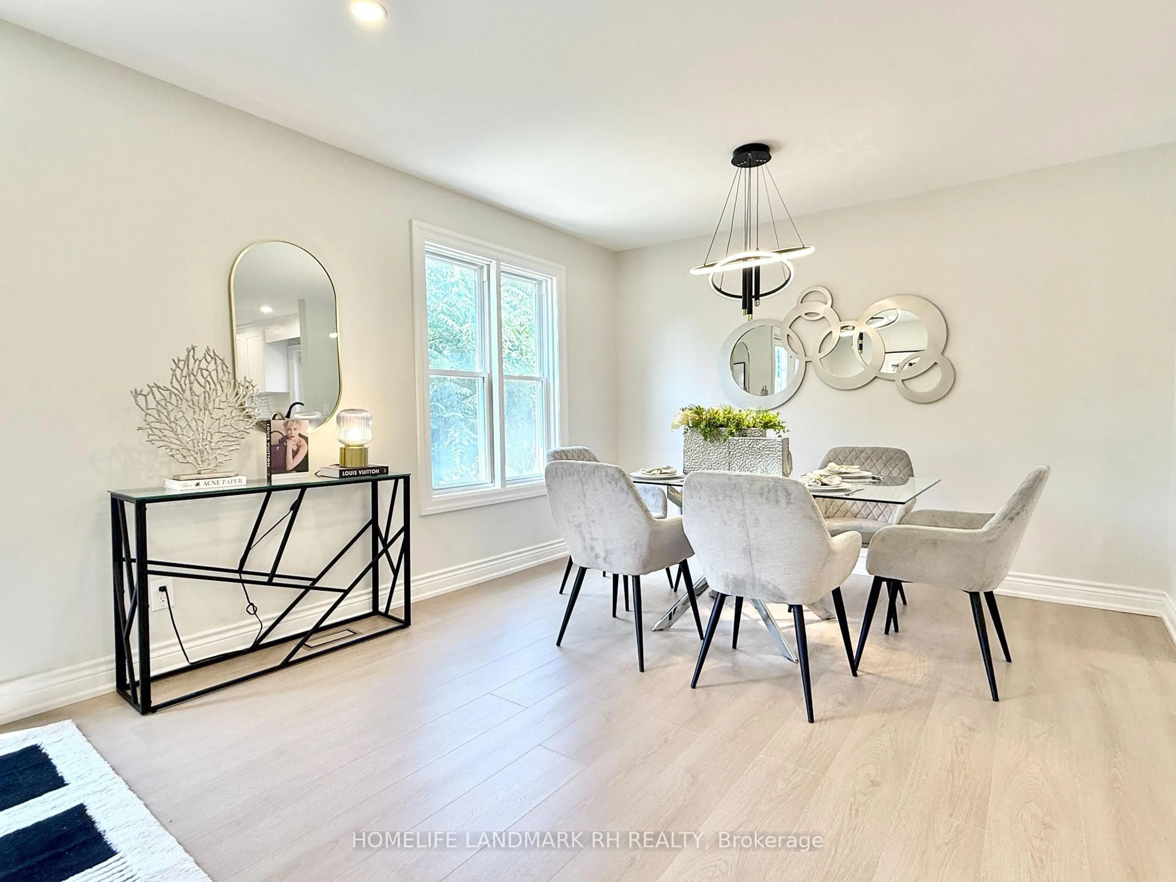 Dining room, wood/laminate floor for 100 Micmac Cres, Toronto Ontario M2H 2K2