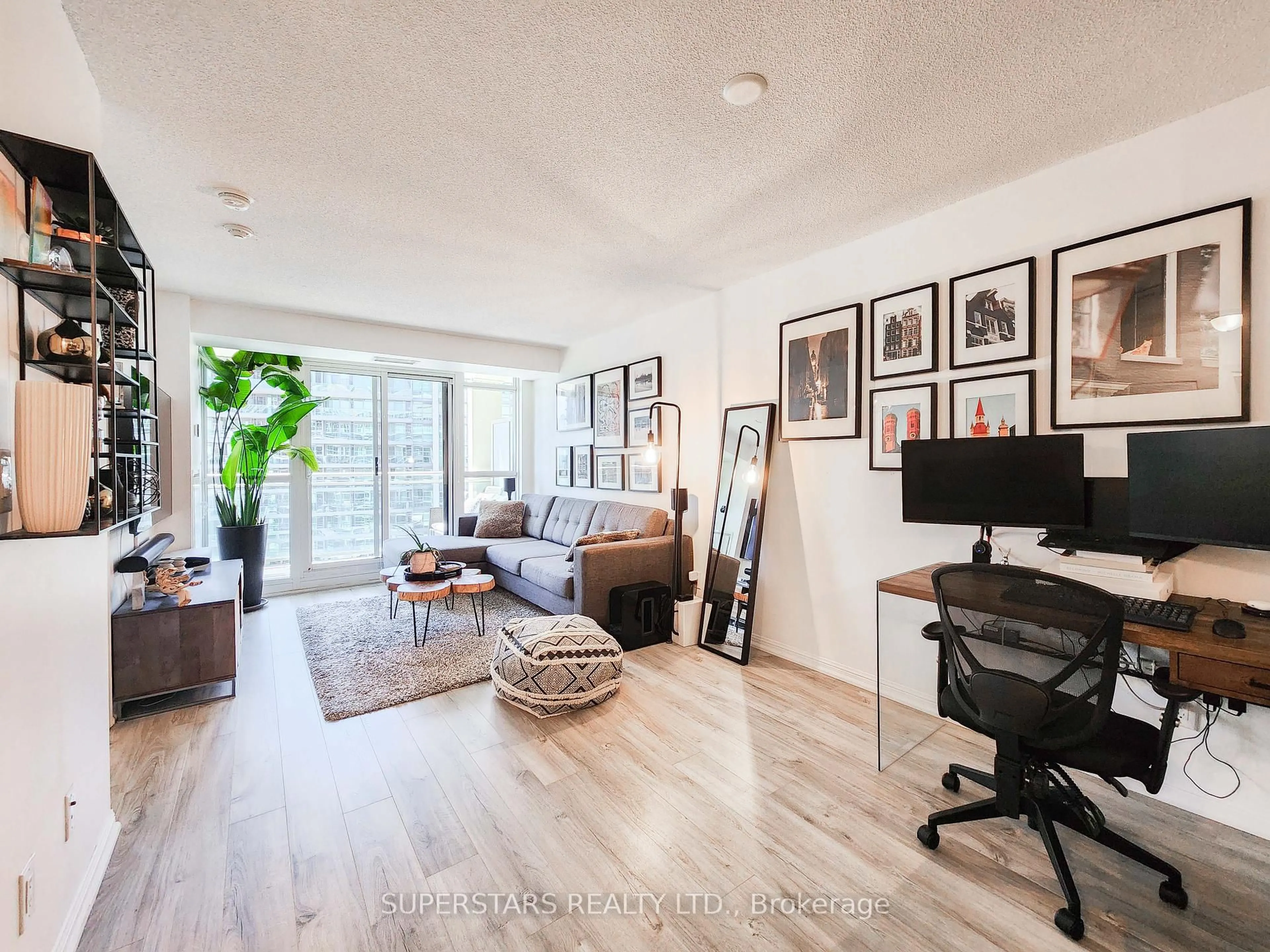 Living room with furniture, wood/laminate floor for 35 Bastion St #1713, Toronto Ontario M5V 0C2
