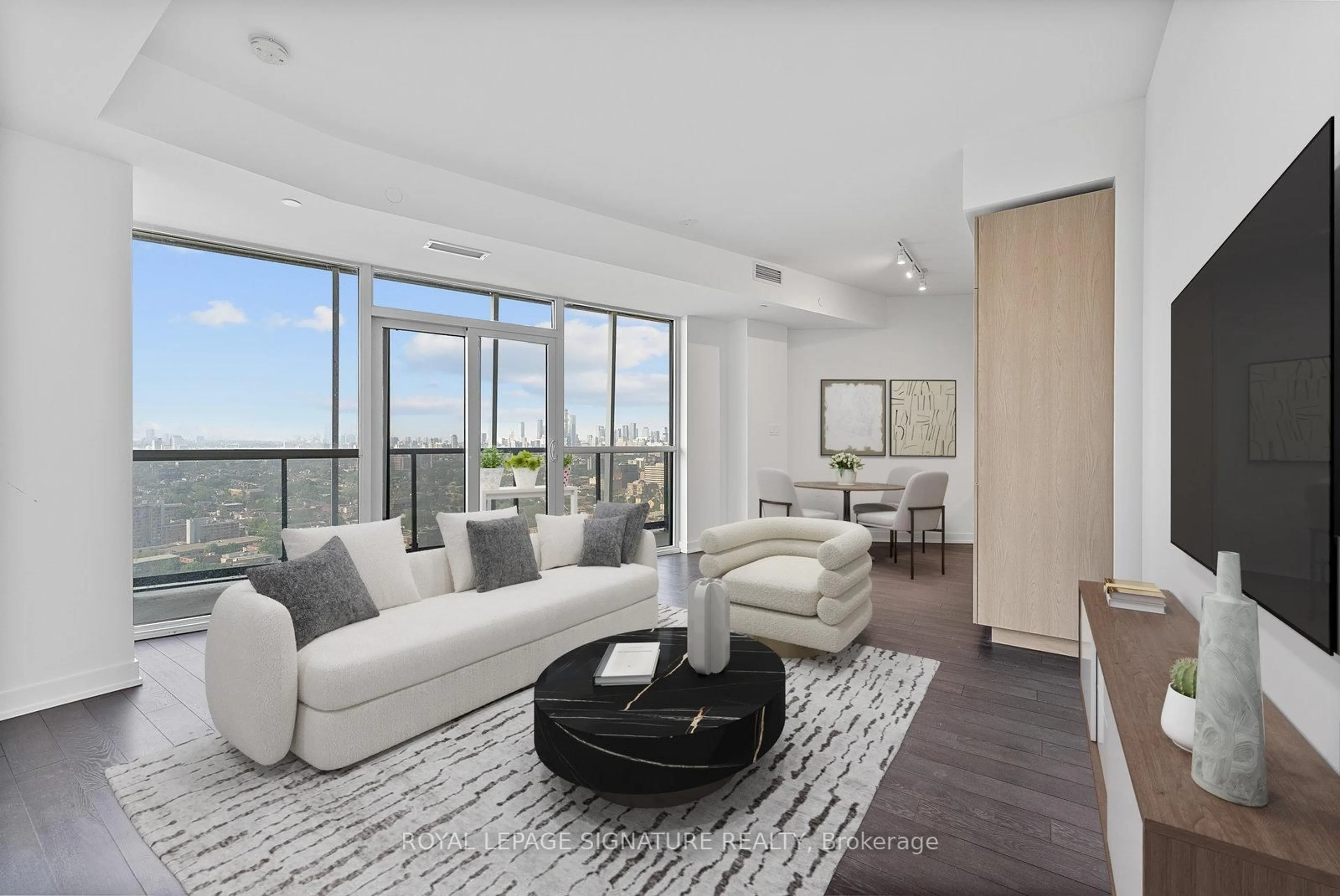 Living room with furniture, unknown for 50 Ordnance St #2909, Toronto Ontario M6K 0C9
