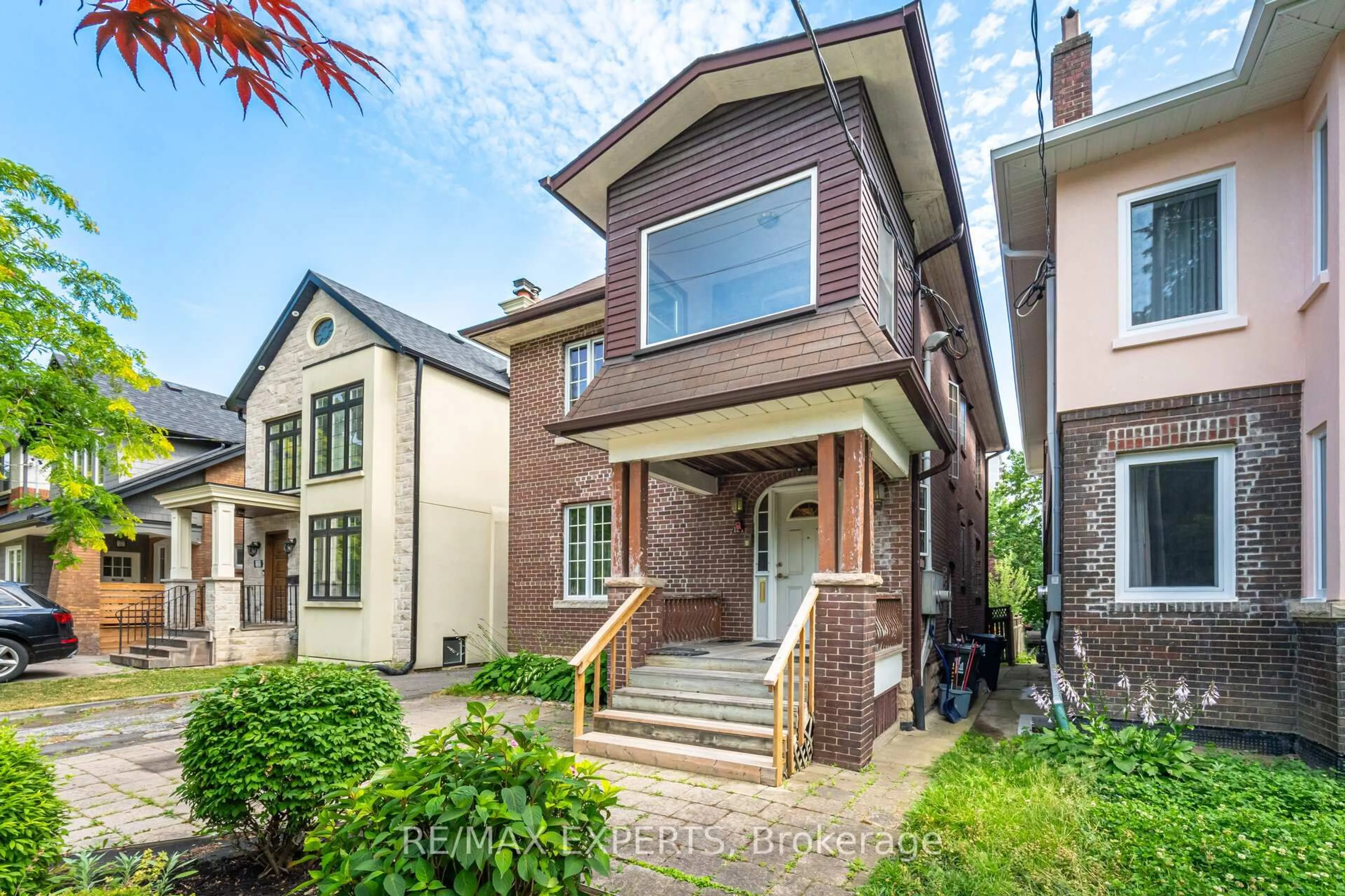 Home with brick exterior material, street for 121 Belsize Dr, Toronto Ontario M4S 1L3