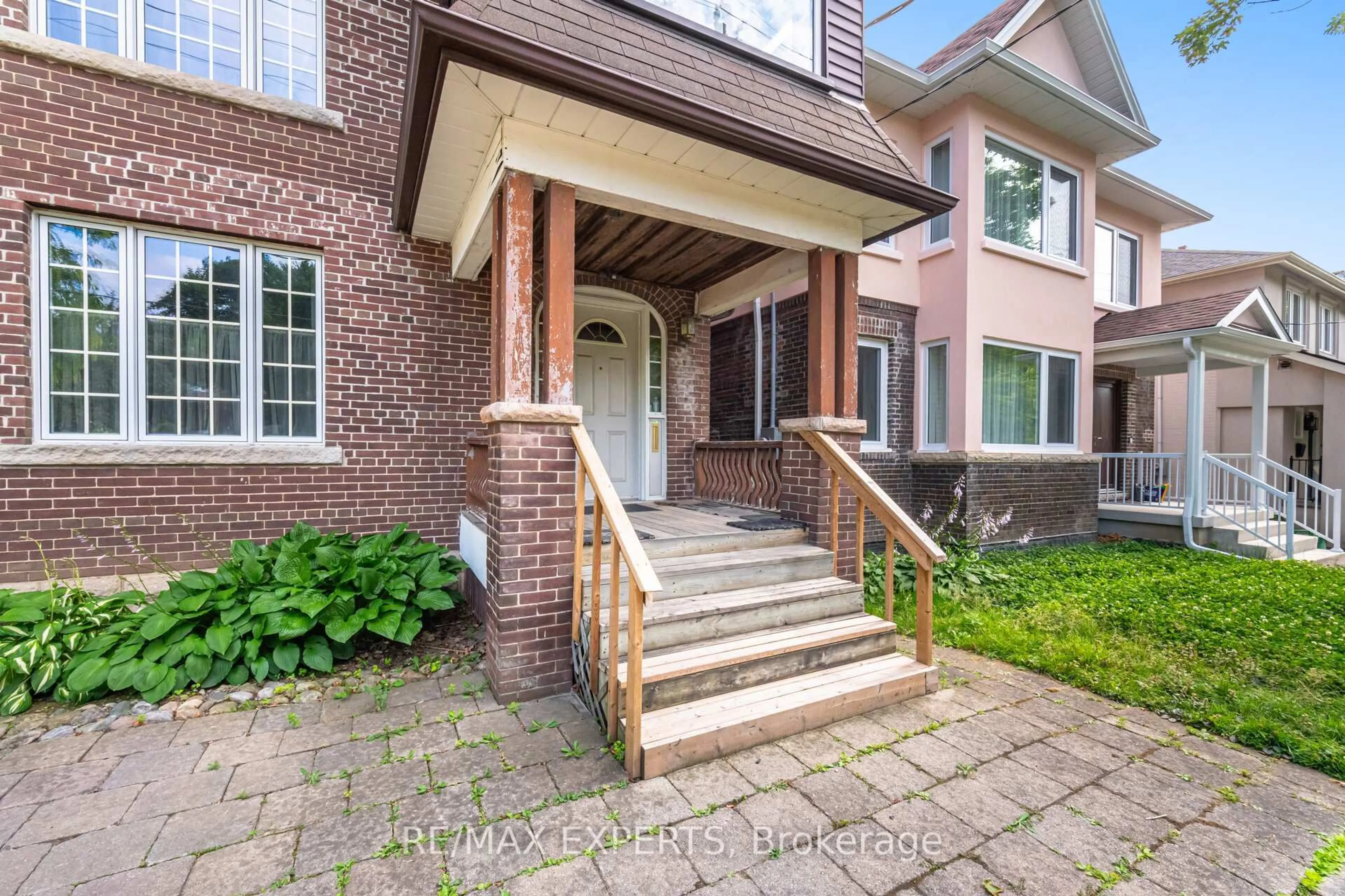 Home with brick exterior material, street for 121 Belsize Dr, Toronto Ontario M4S 1L3