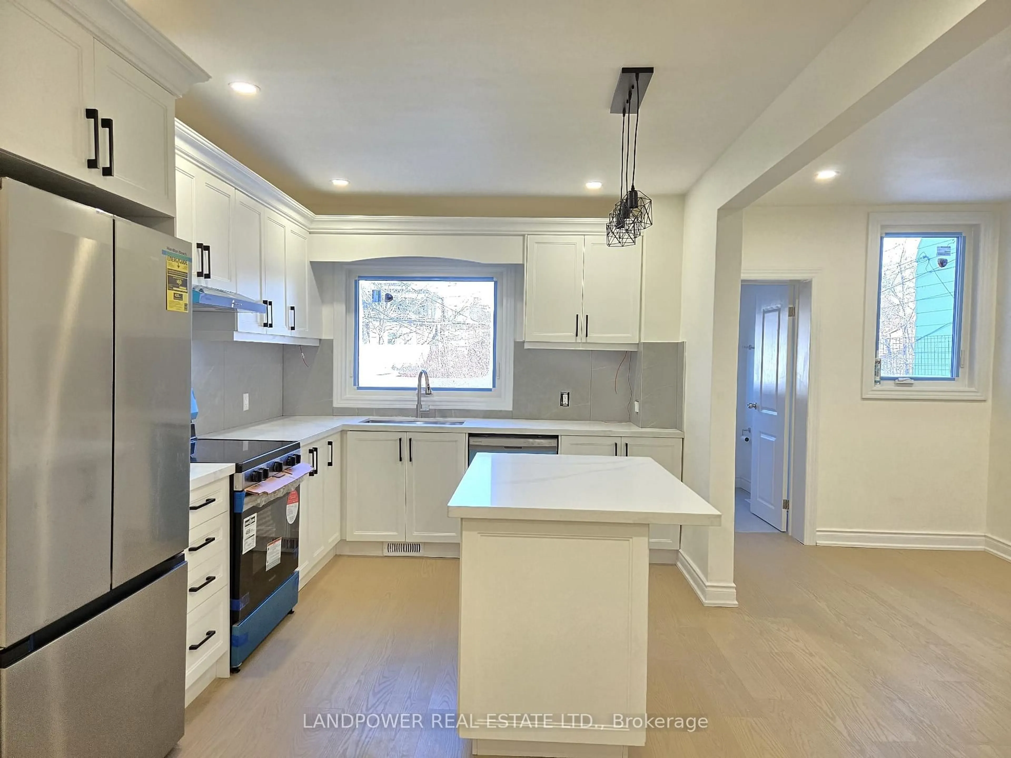 Open concept kitchen, ceramic/tile floor for 1745 Dufferin St, Toronto Ontario M6E 3N9