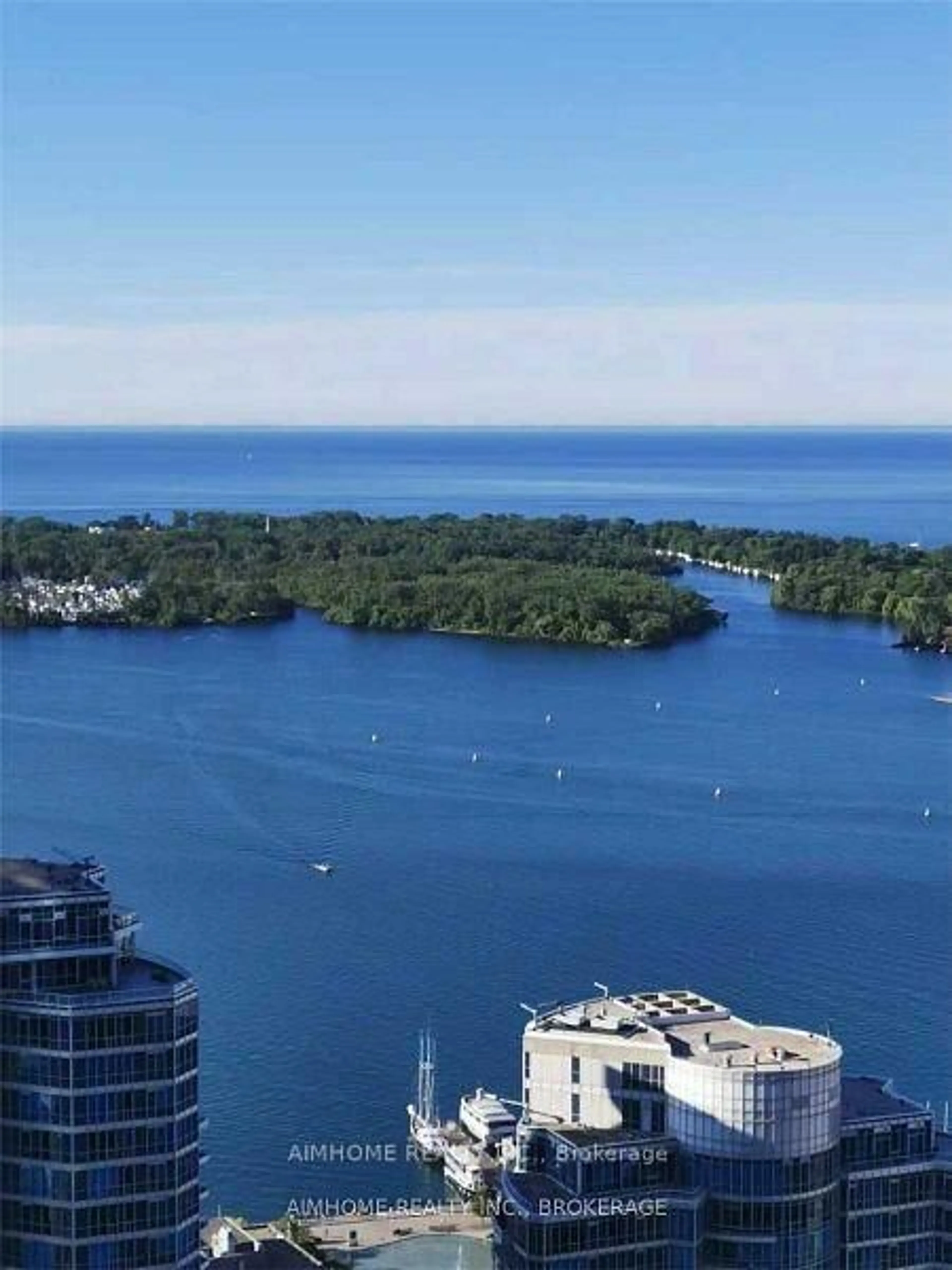A pic from outside/outdoor area/front of a property/back of a property/a pic from drone, water/lake/river/ocean view for 14 York St #5205, Toronto Ontario M5J 0B1