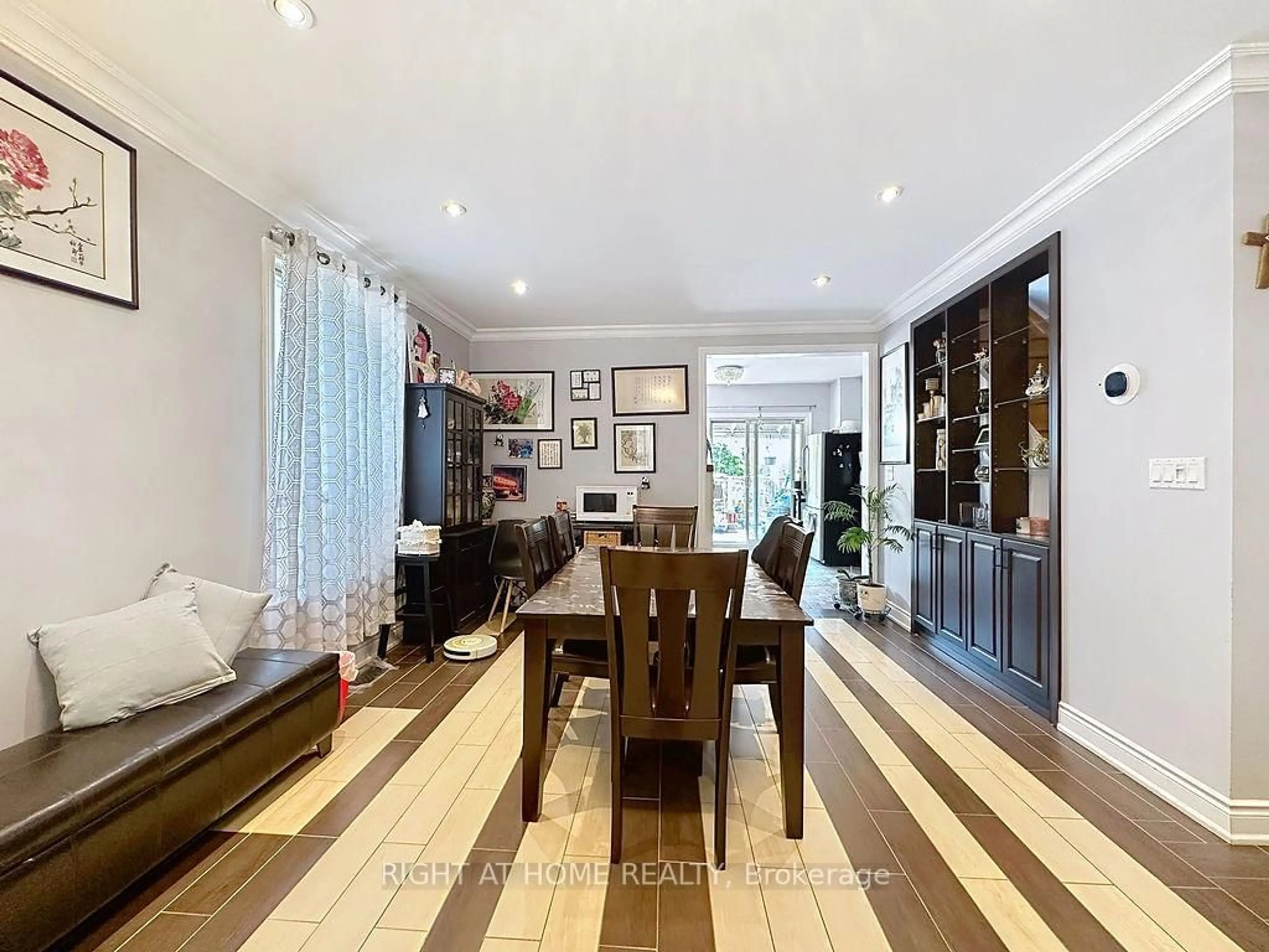 Dining room, wood/laminate floor for 132 Bellwoods Ave, Toronto Ontario M6J 2P4