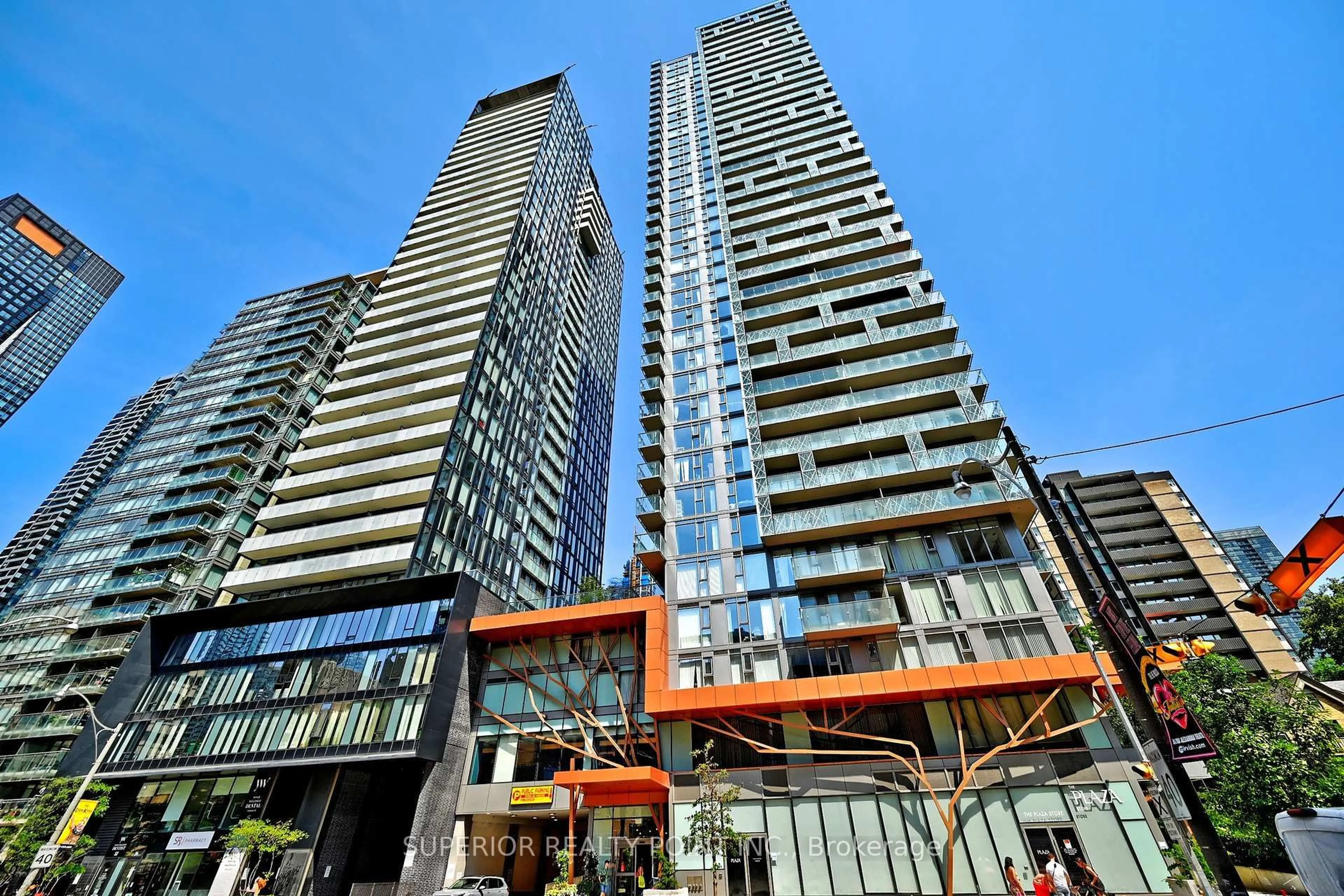 Patio, city buildings view from balcony for 50 Wellesley St #704, Toronto Ontario M4Y 1G2