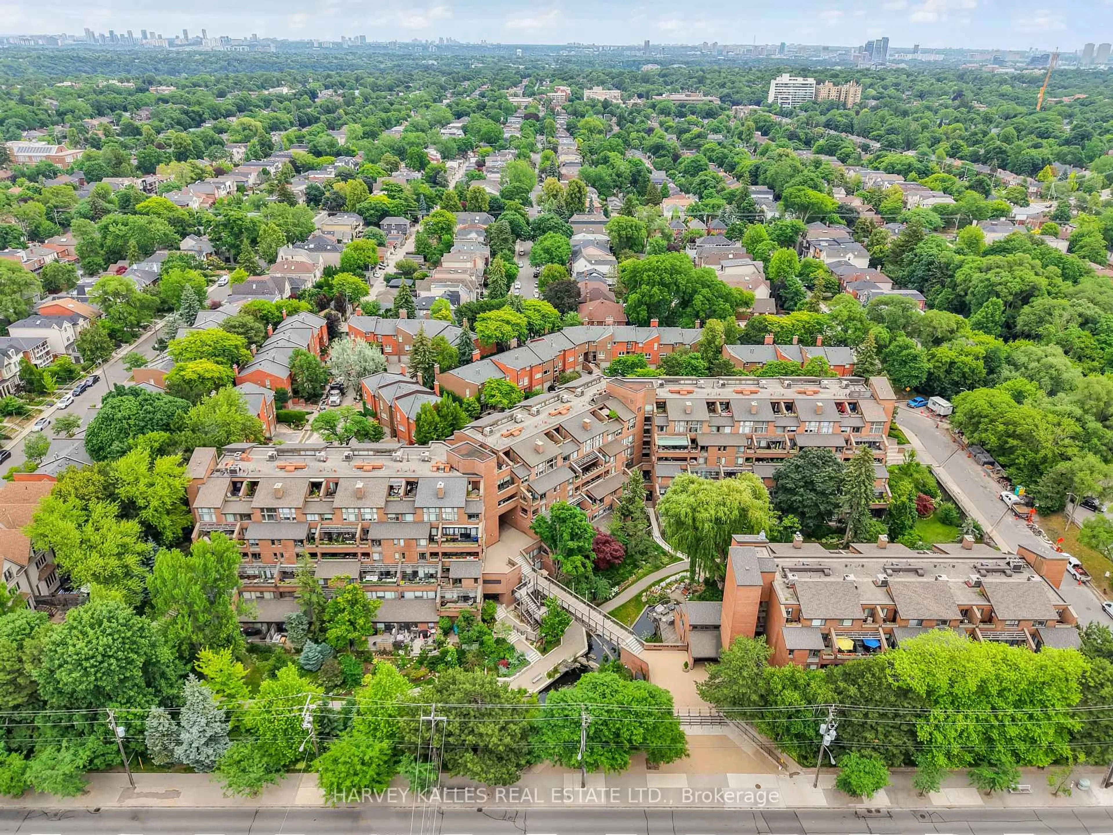 A pic from outside/outdoor area/front of a property/back of a property/a pic from drone, city buildings view from balcony for 40 Sylvan Valley Way #324-325, Toronto Ontario M5M 4M3